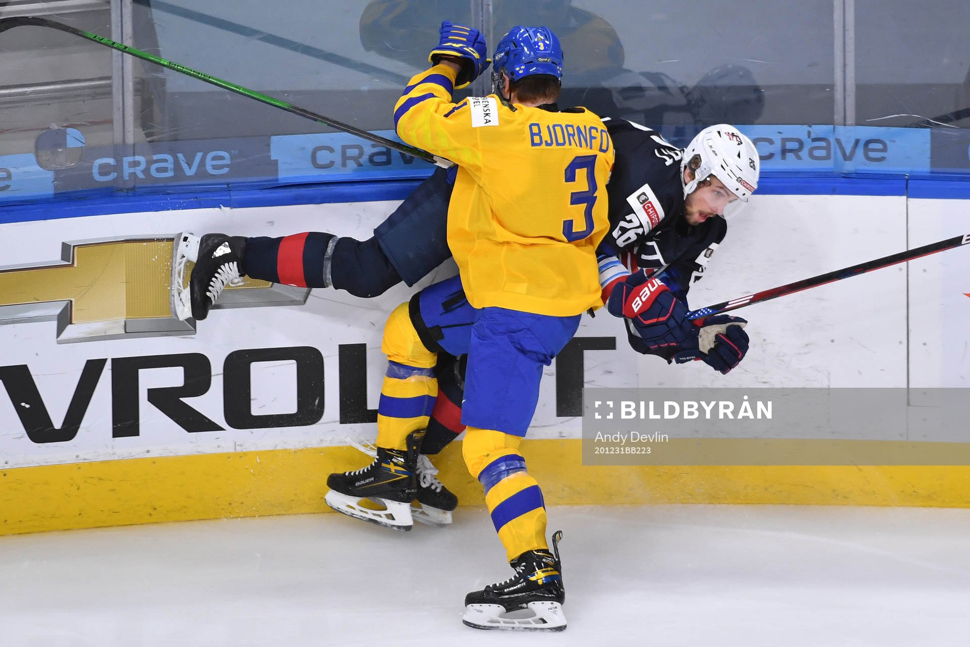 Tobias Björnfot of Sweden takes Landon Slaggert of USA