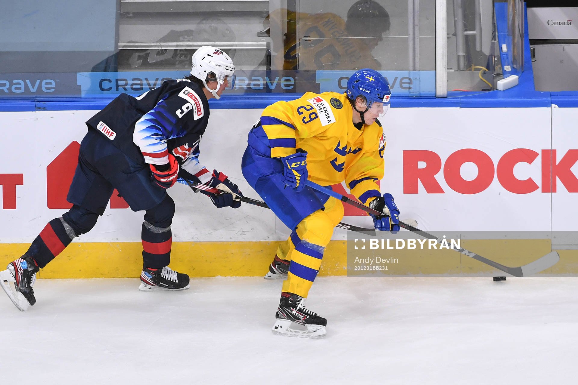 Trevor Zegras of USA pursues Albin Sundsvik of Sweden