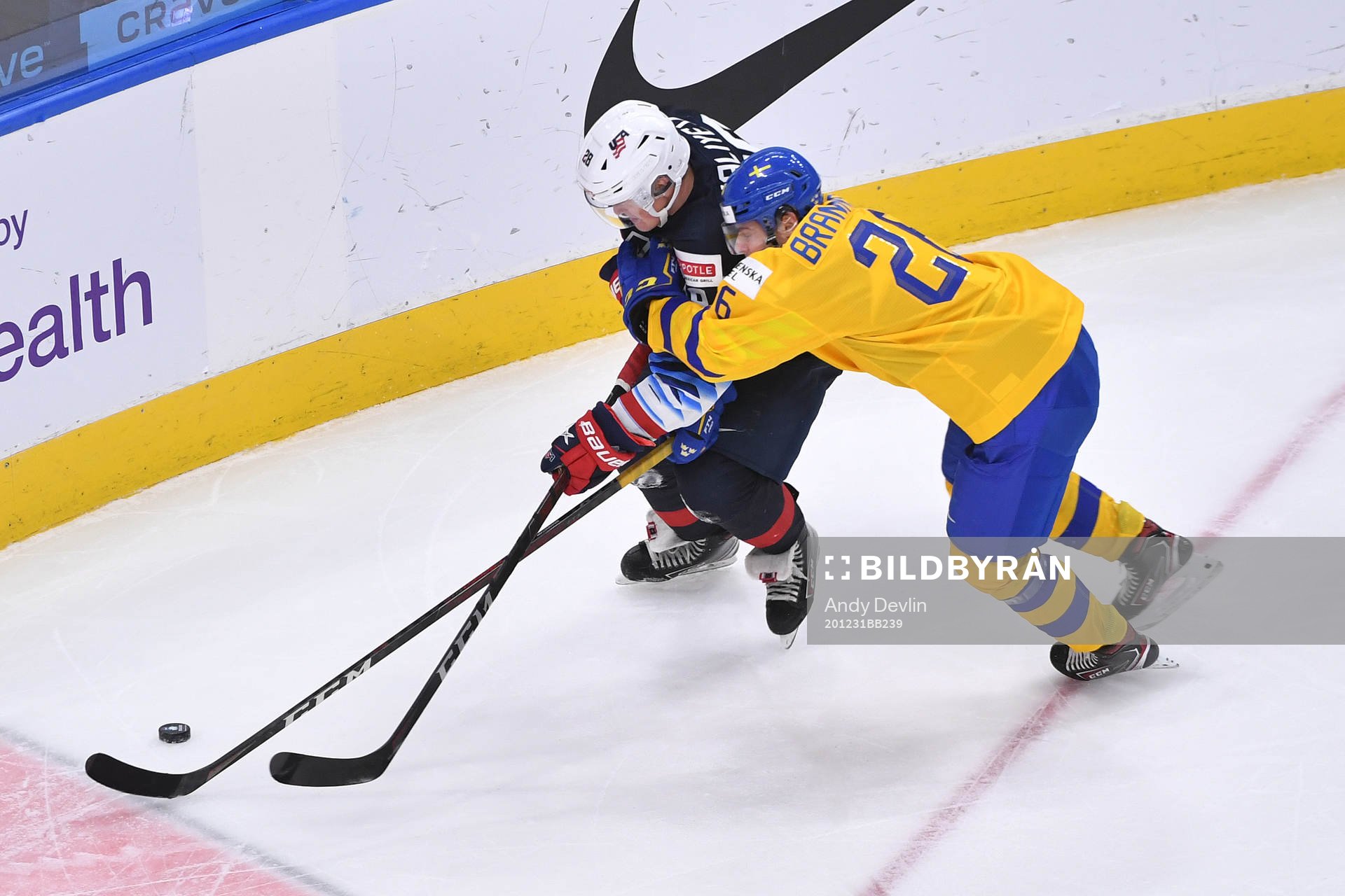 Alex Brännstam of Sweden ties up Arthur Kaliyev of USA