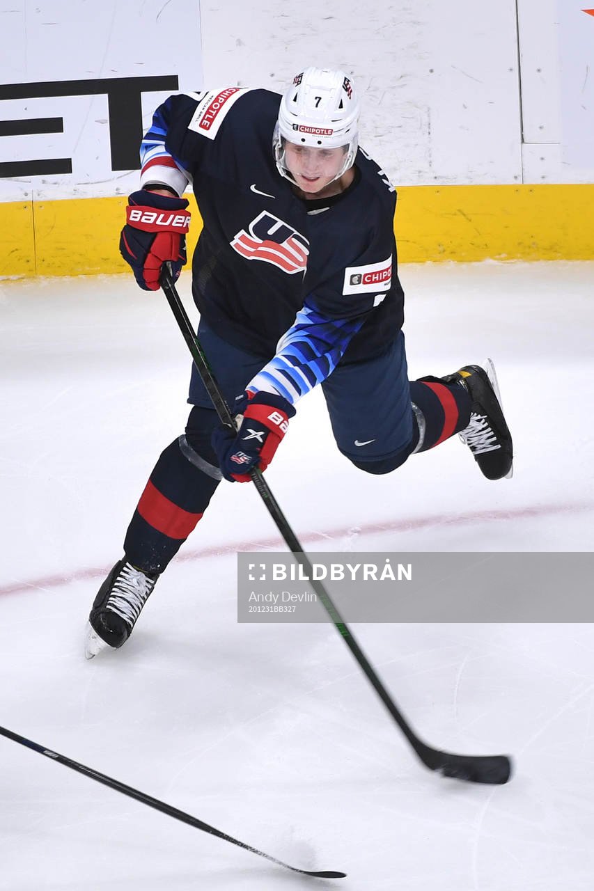 Tyler Kleven of USA shoots the puck