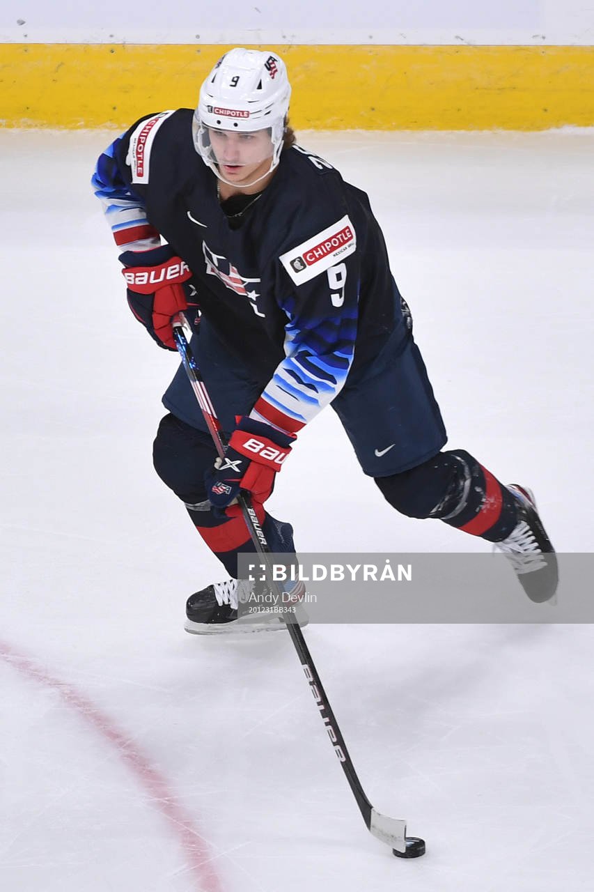 Trevor Zegras of USA skates with the puck