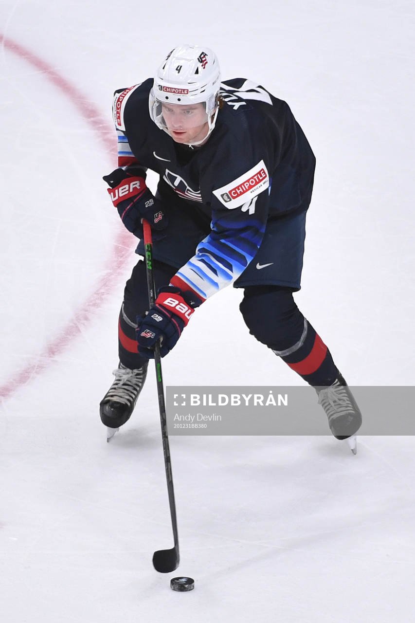 Cam York of USA skates with the puck