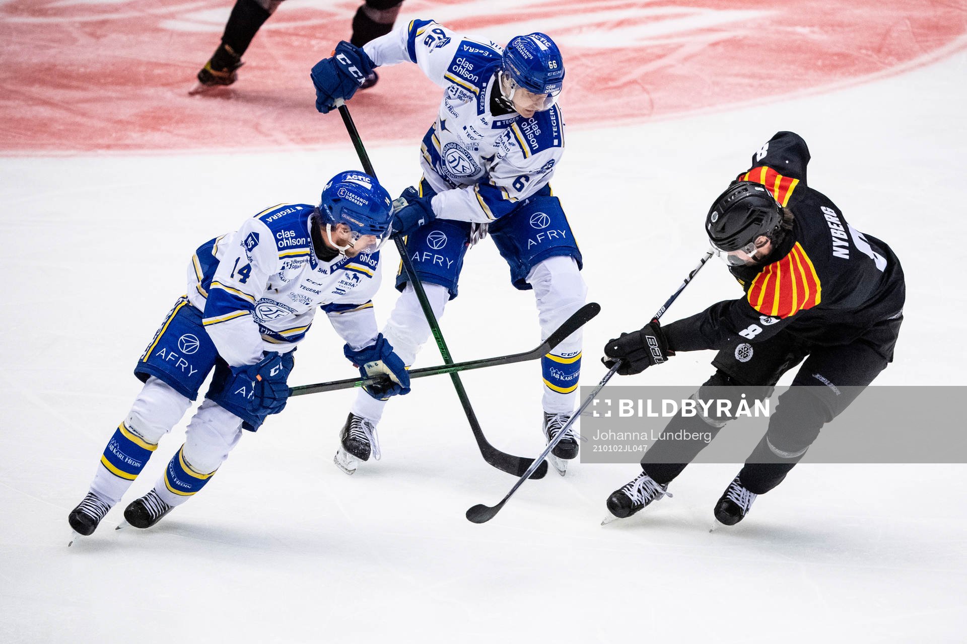 Leksands Oskar Lang och Nils Åman mot Brynäs John Nyberg