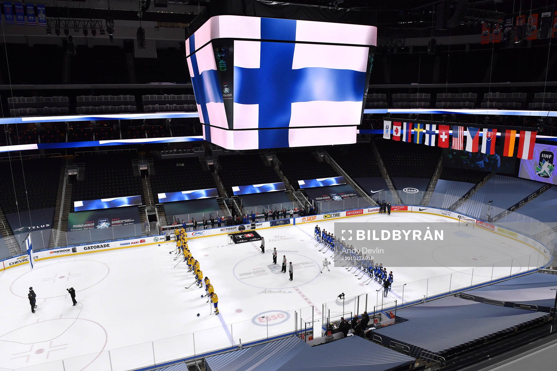 Team Finland and Team Sweden stand for the Finland national