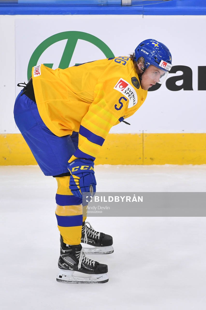 Philip Broberg of Sweden looks towards the opponents end ice