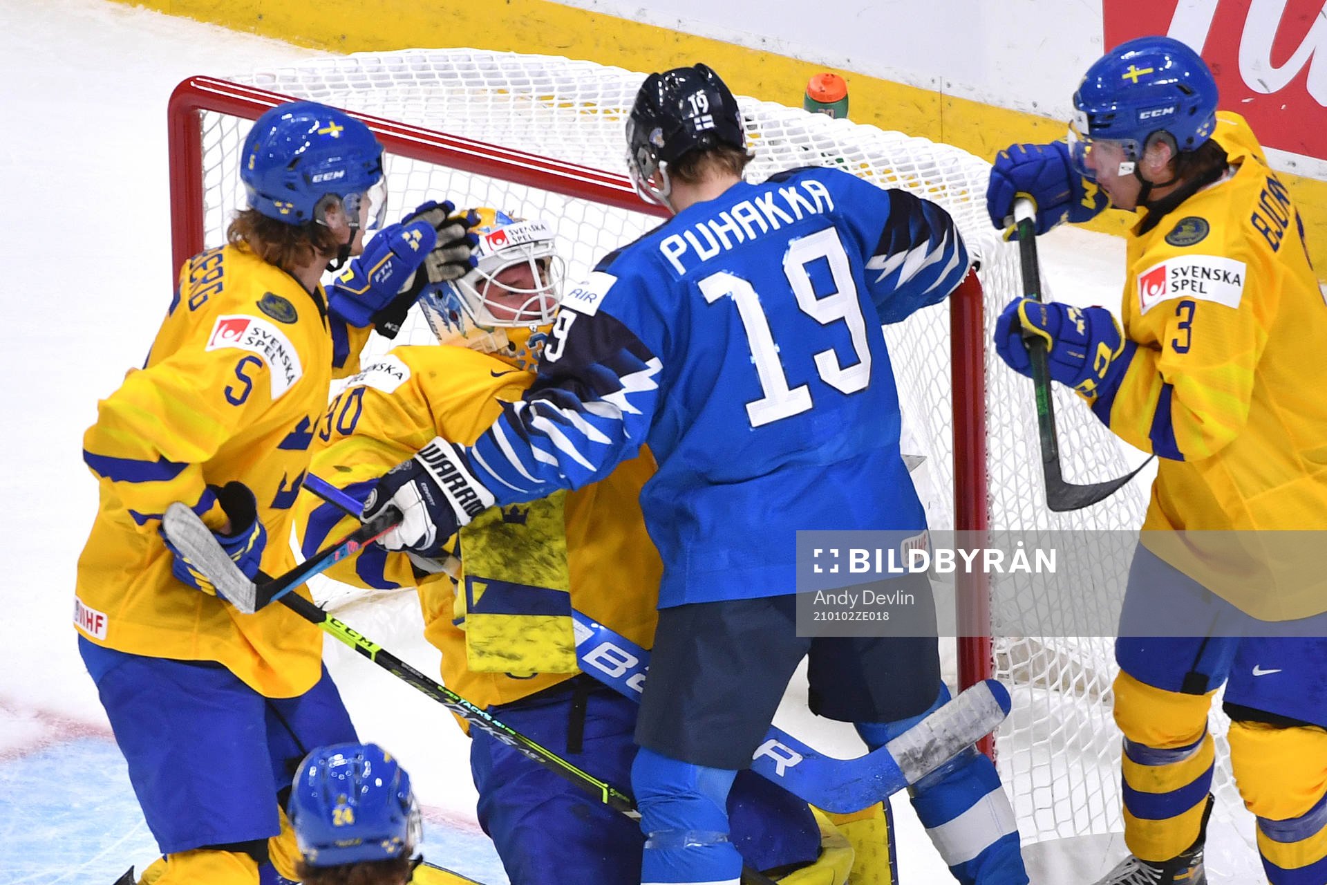 Petteri Puhakka of Finland collides with Hugo Alnefelt of