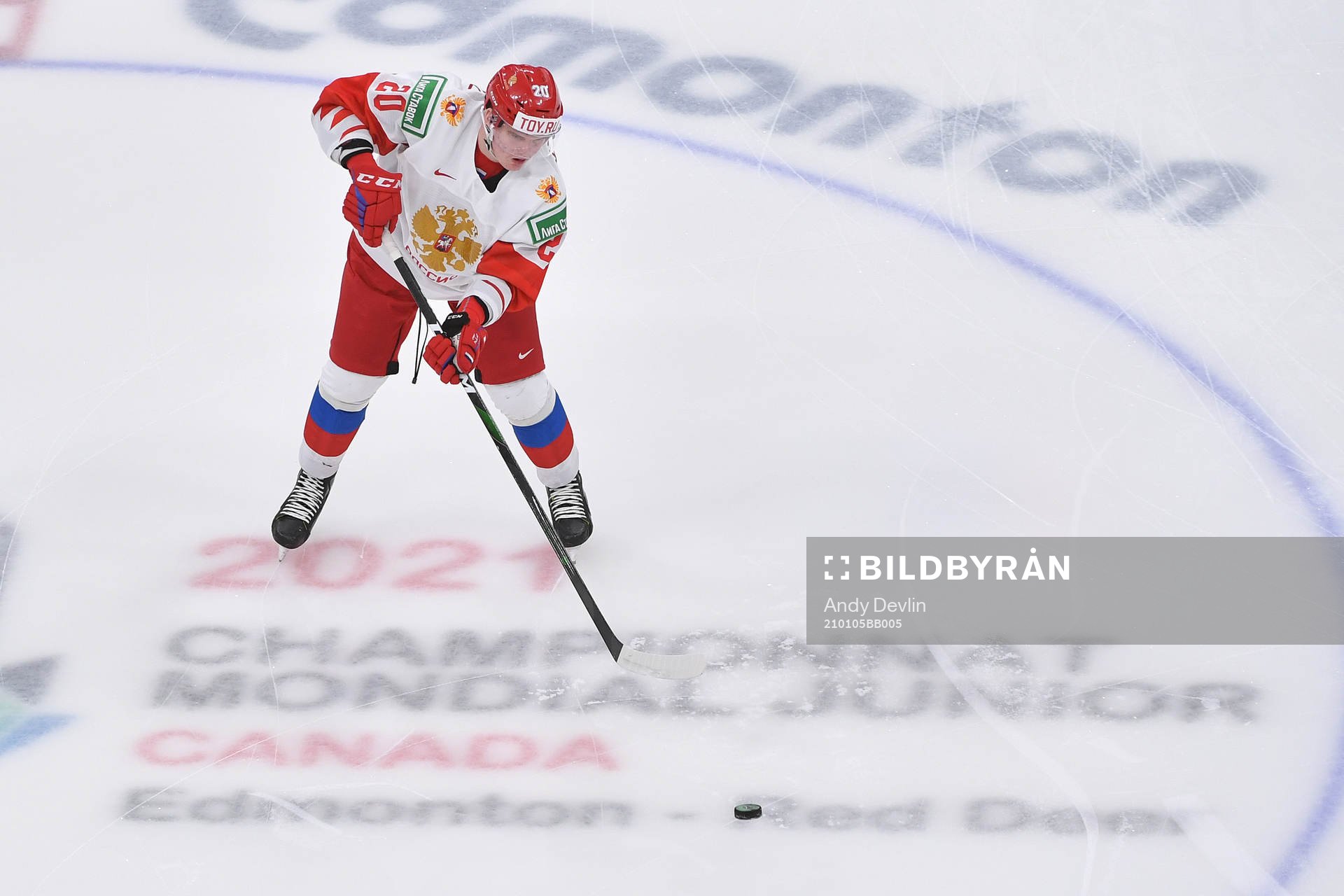 Kirill Kirsanov of Russia passes the puck