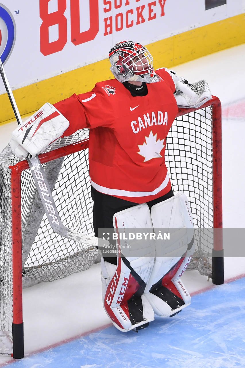 Devon Levi of Canada participates in warm up