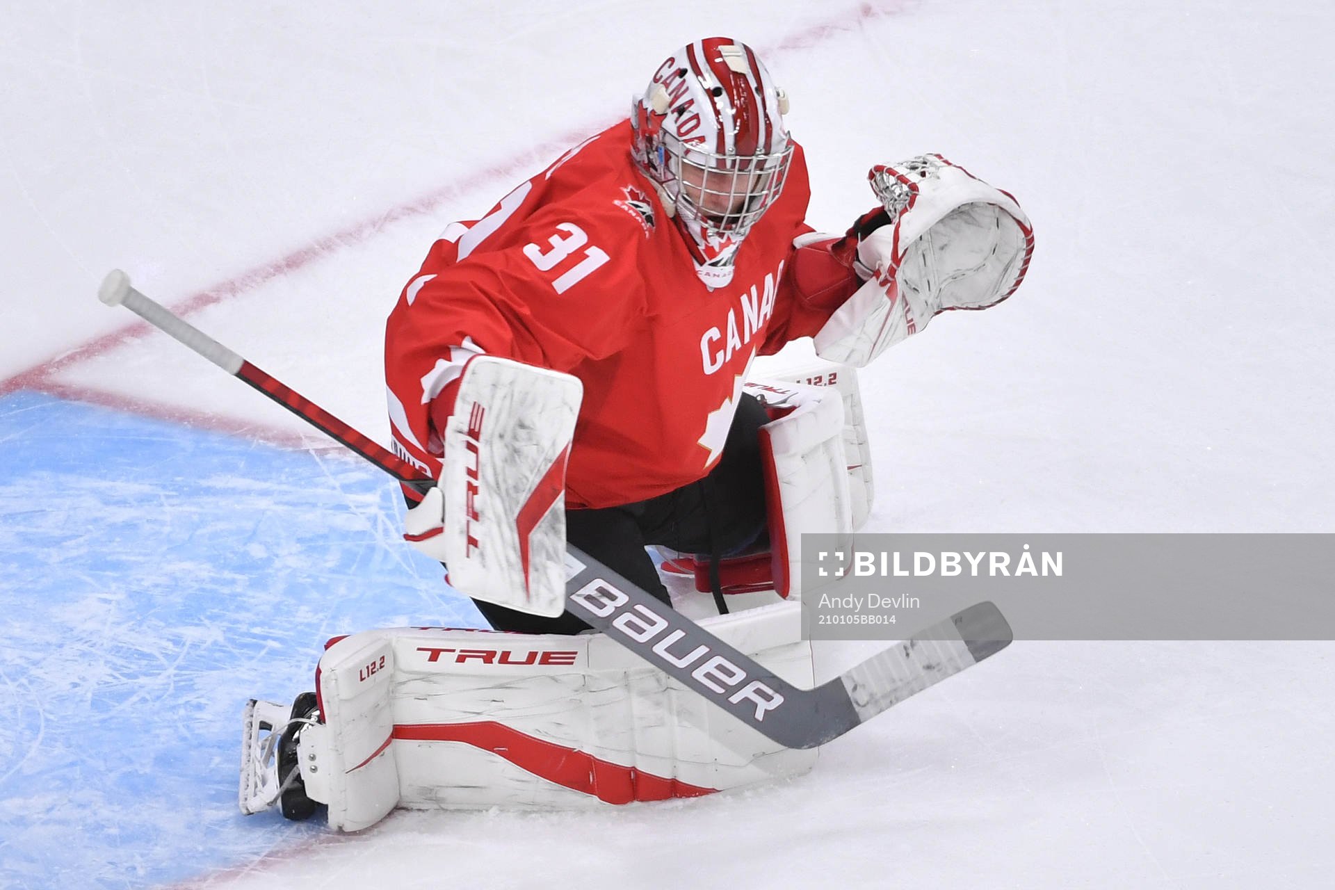 Dylan Garand of Canada participates in warm up