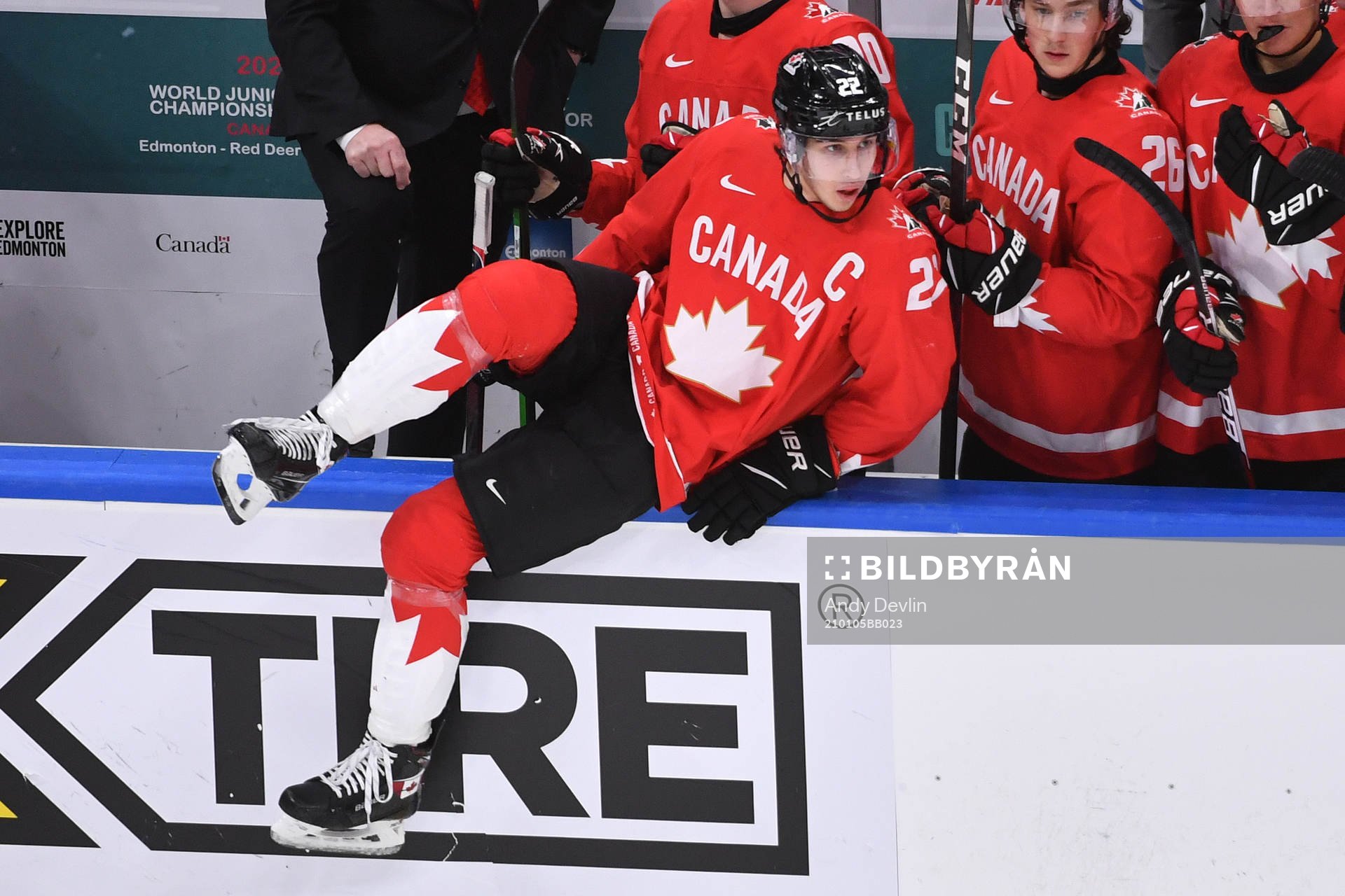 Dylan Cozens of Canada jumps the