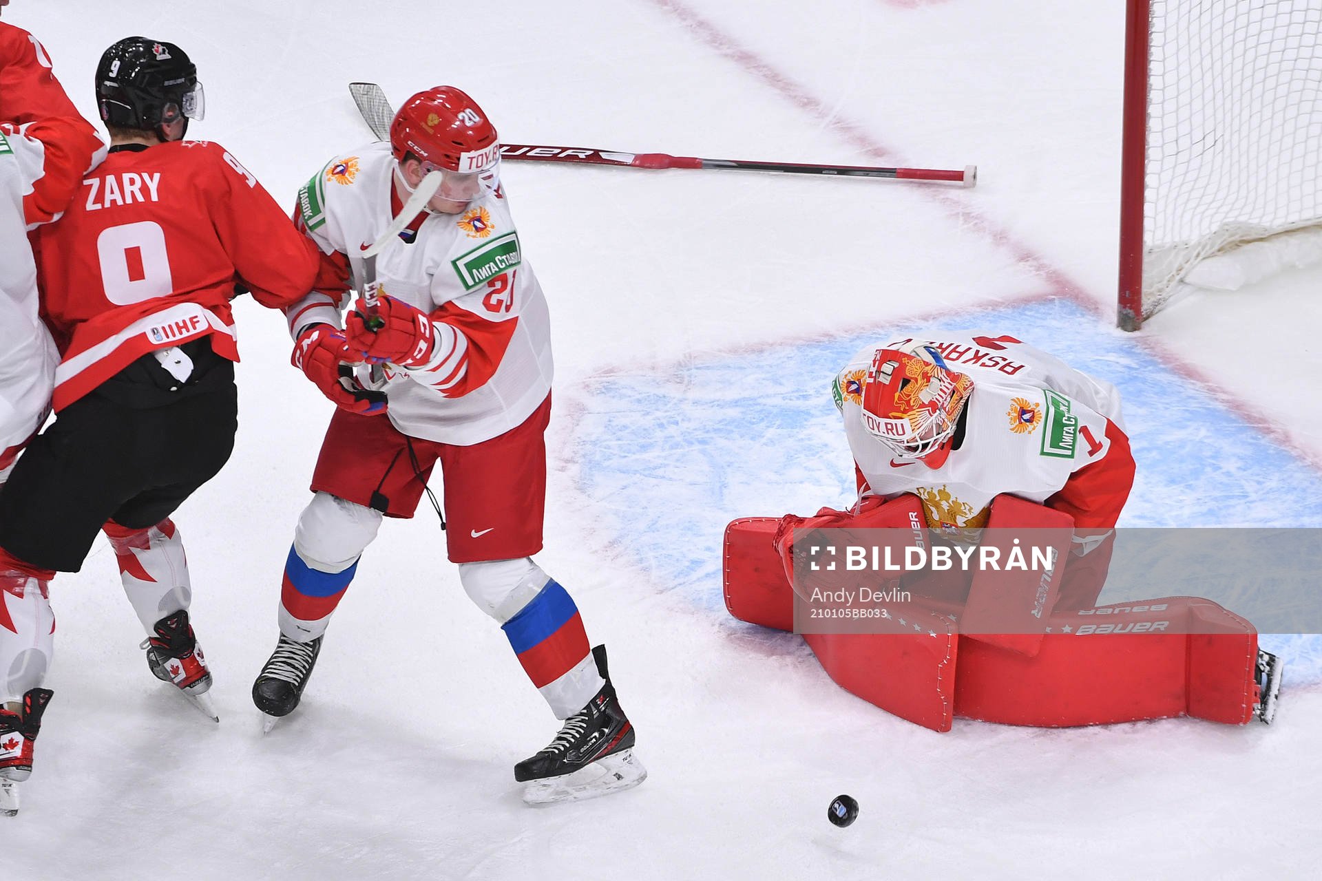 As Connor Zary of Canada looks