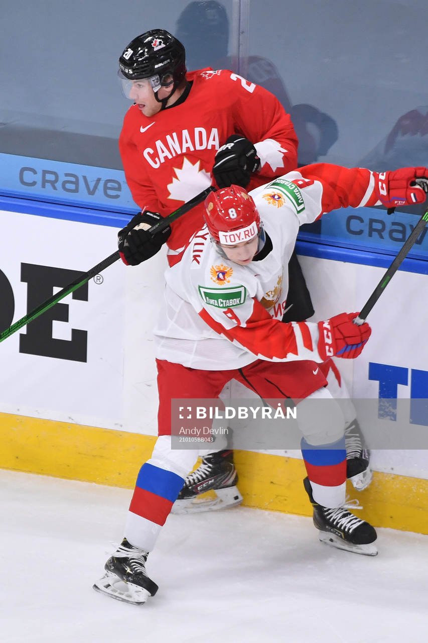Arseni Gritsyuk of Russia collides with Dawson Mercer of