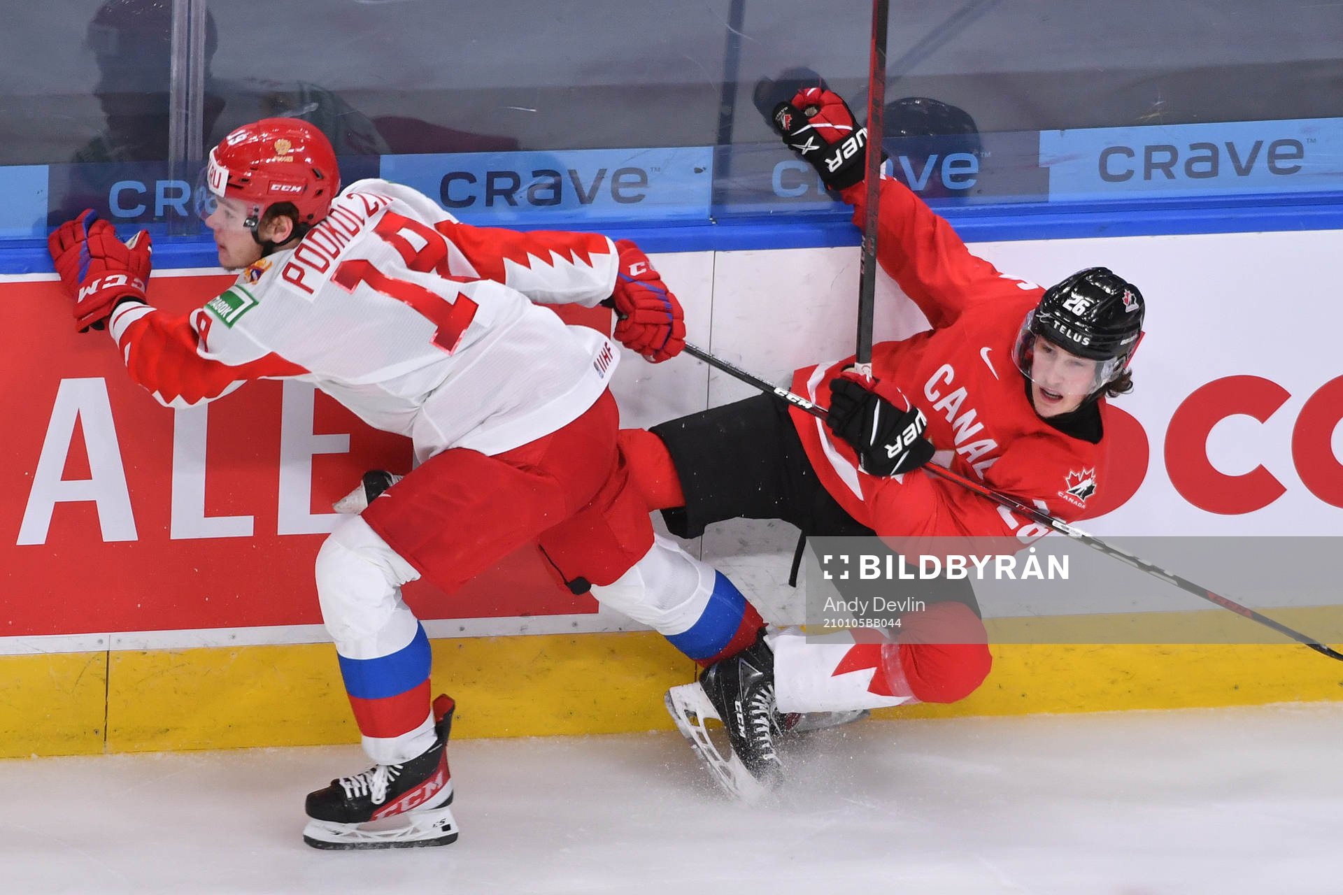 Vasili Podkolzin of Russia collides with Philip Tomasino of