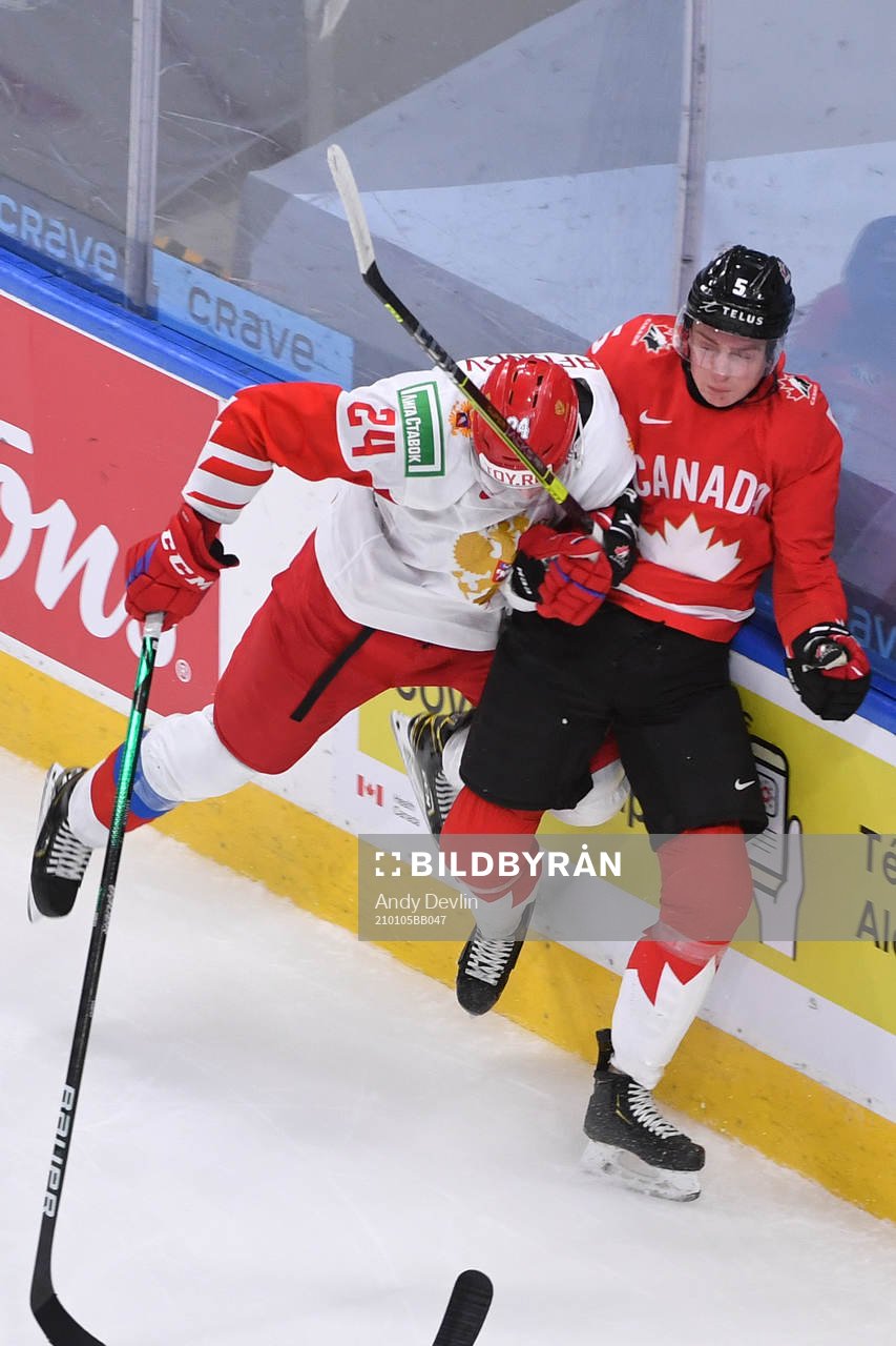 Ilya Safonov of Russia collides with Thomas Harley of Canada