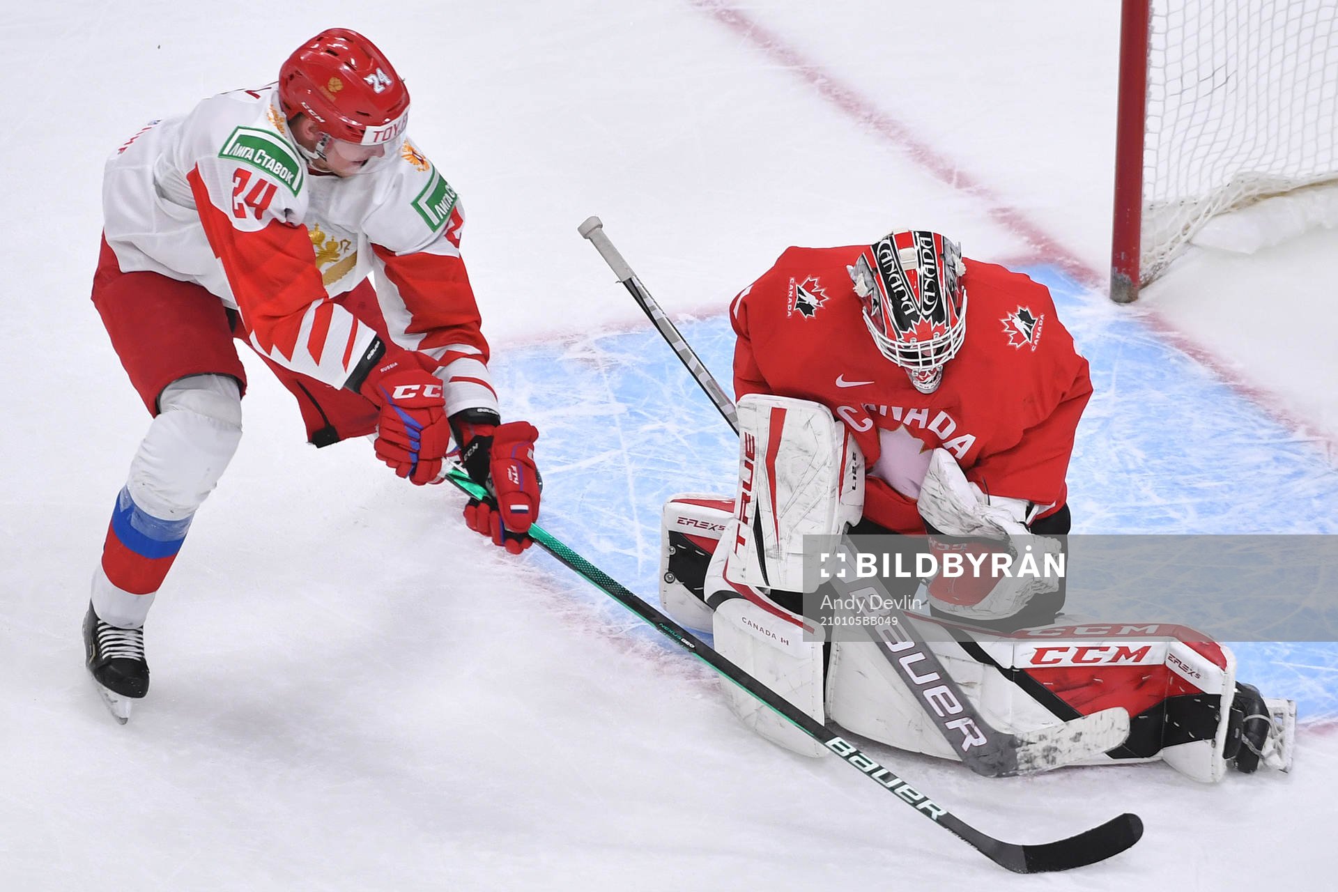 Devon Levi of Canada makes save