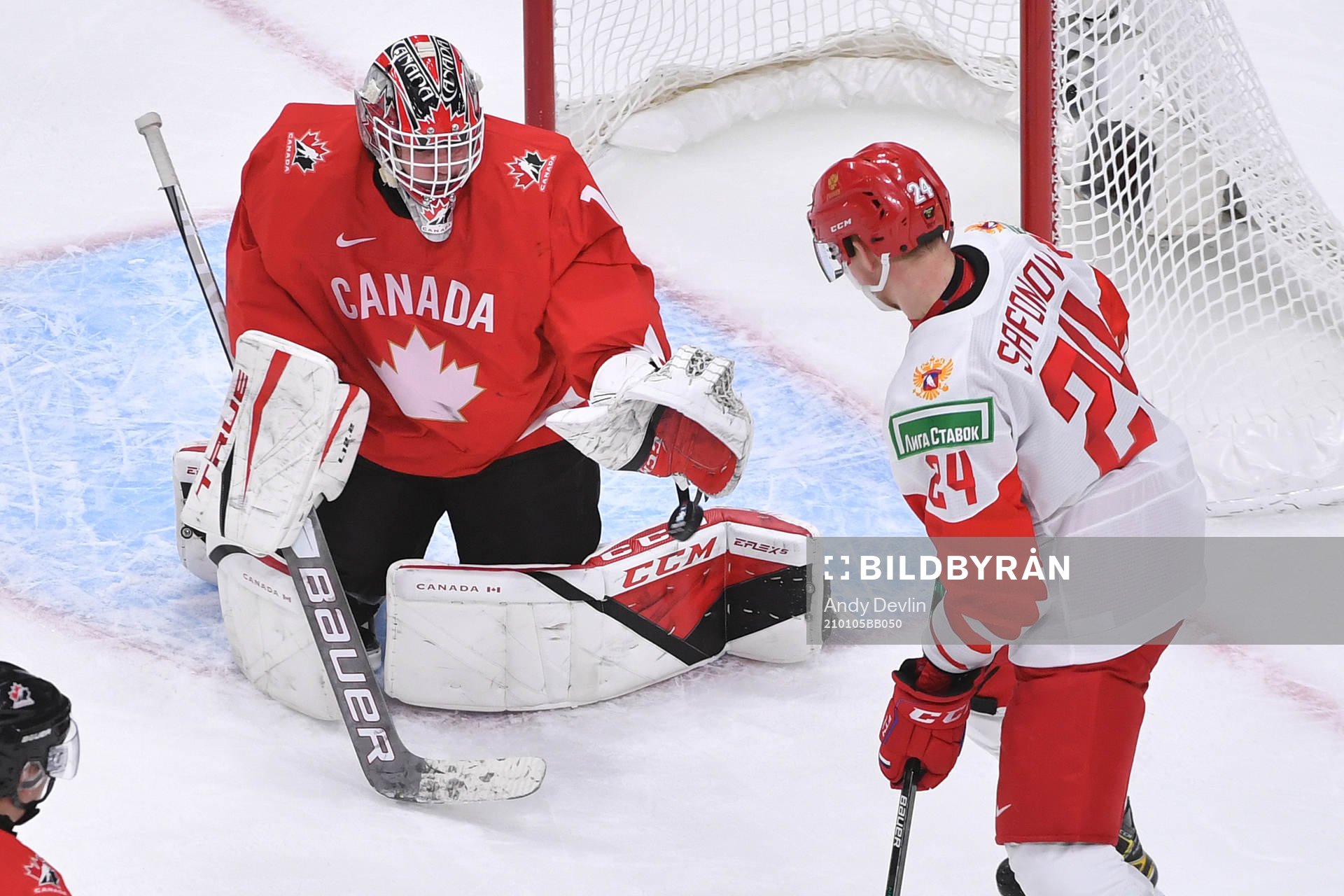Devon Levi of Canada makes save