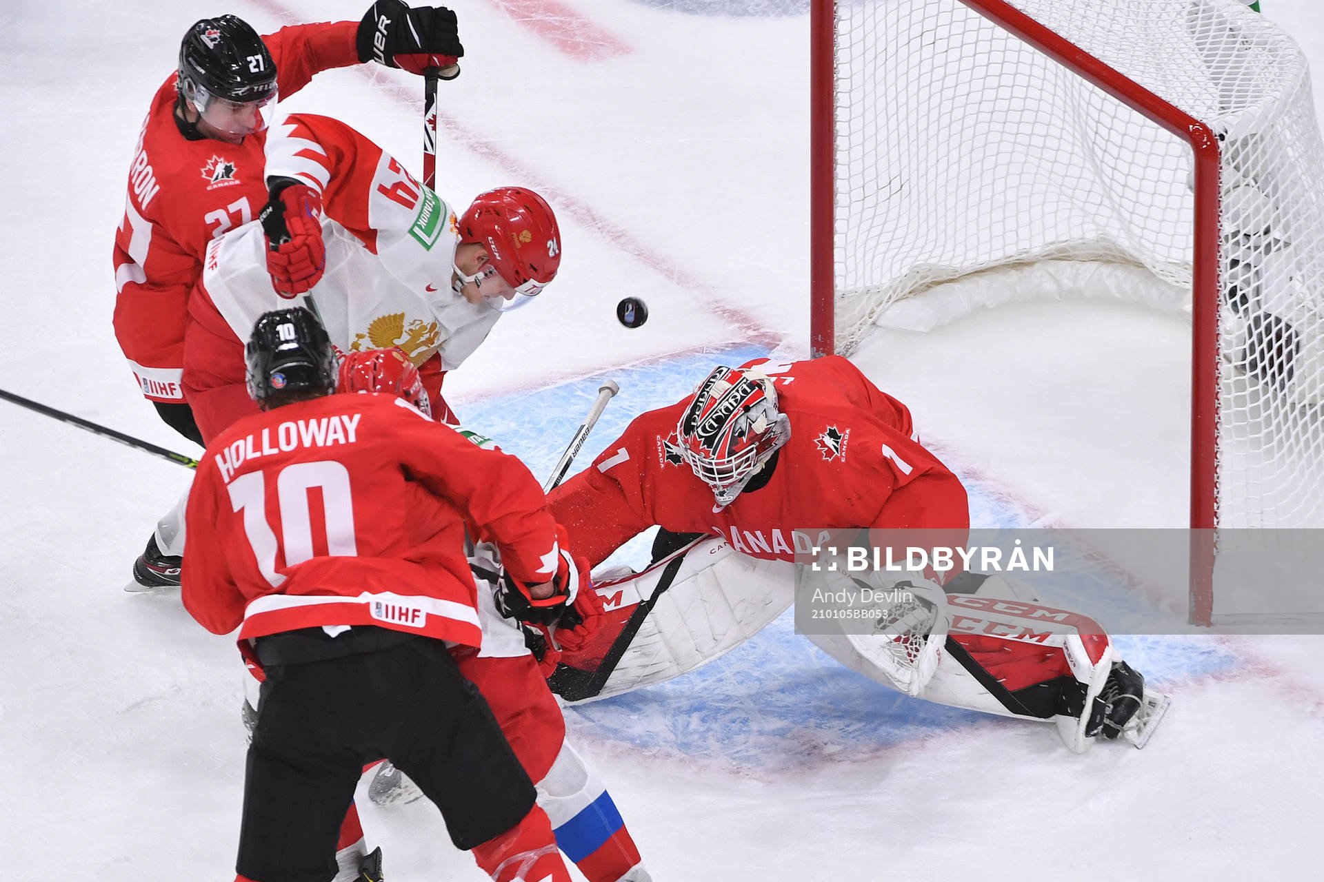 Devon Levi of Canada makes save
