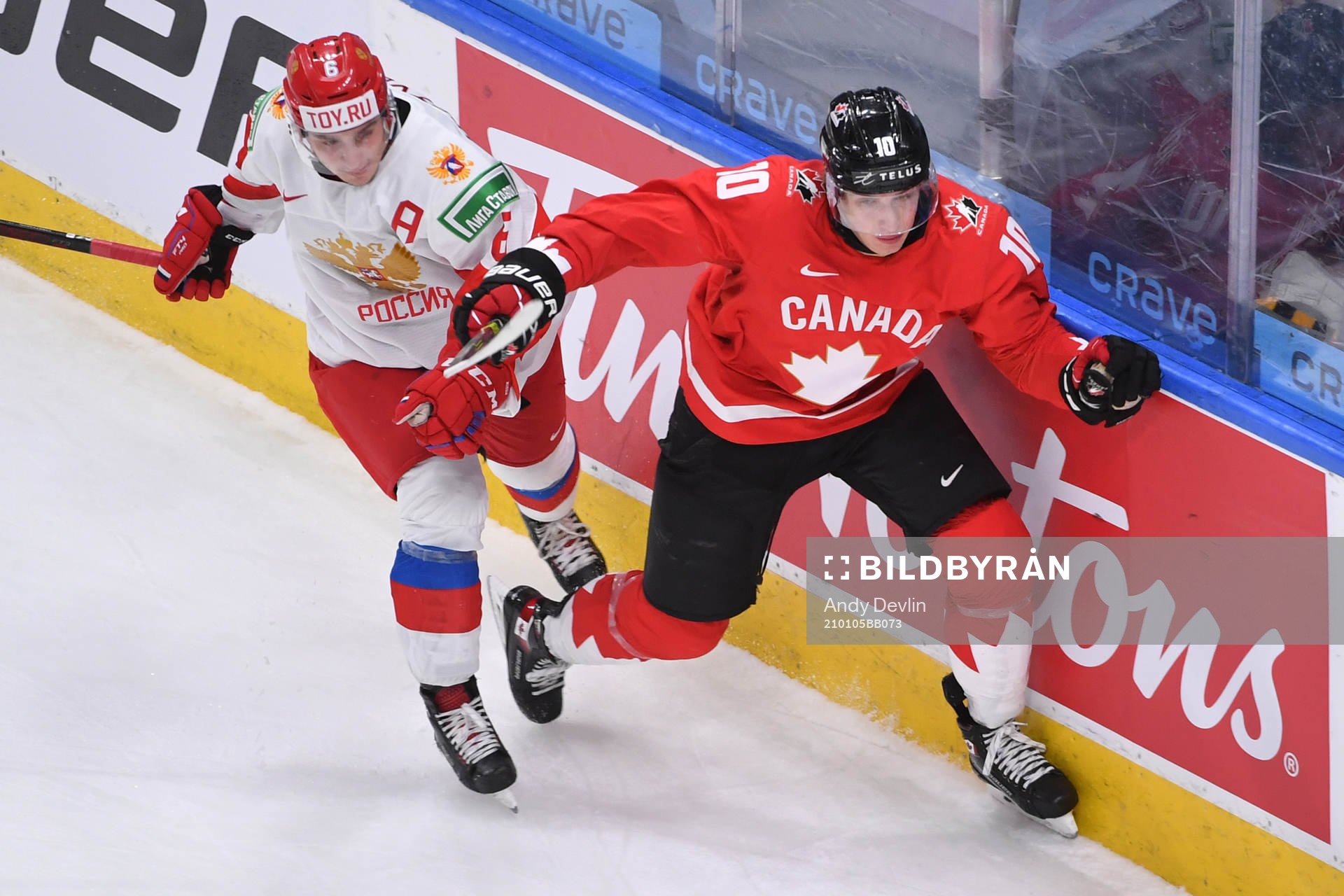 Semyon Chistyakov of Russia collides with Dylan Holloway of