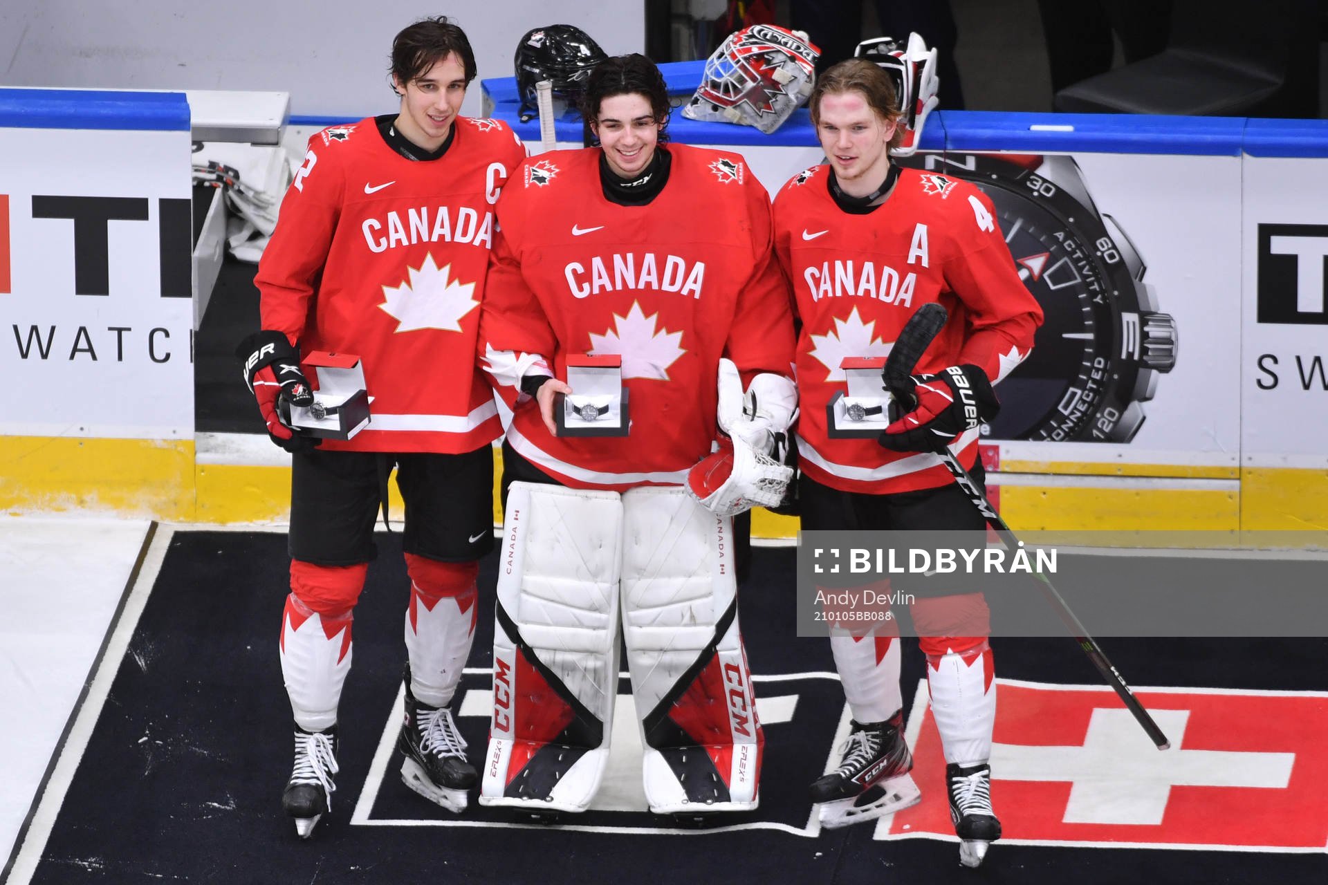 Dylan Cozens, Devon Levi and Bowen Byram of Canada pose