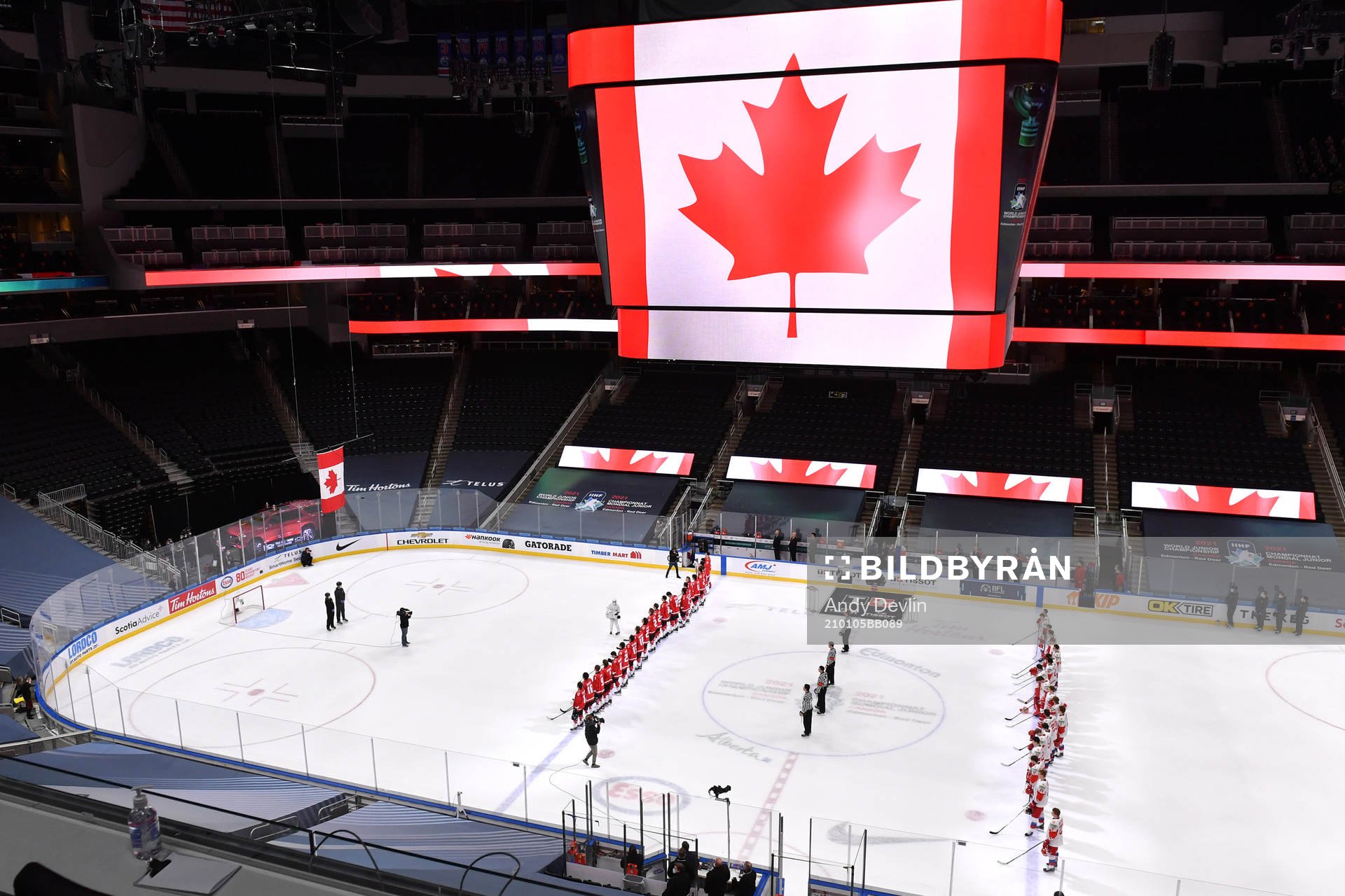 Team Canada and Team Russia stand for the playing of Oh
