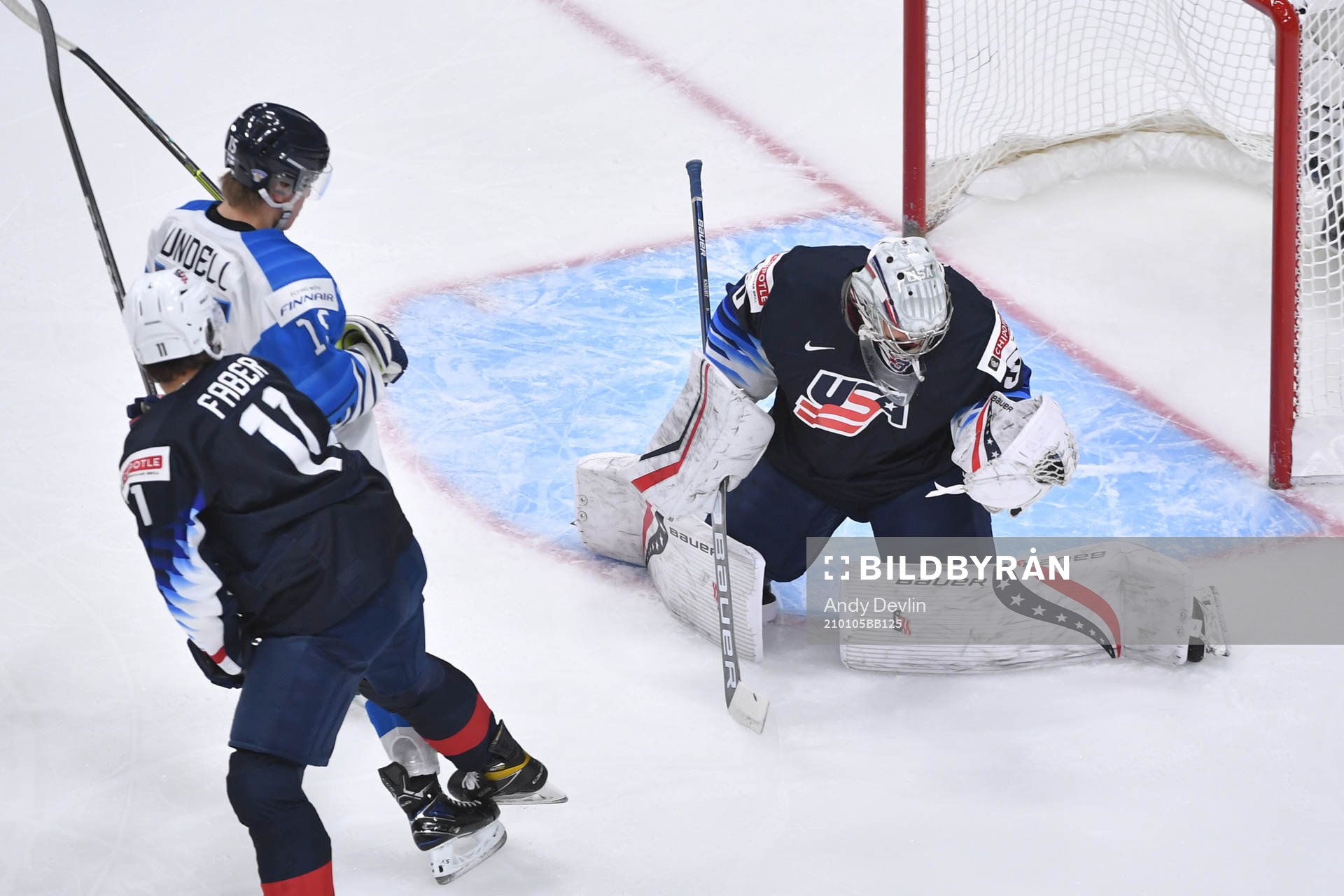 Spencer Knight of USA makes a save