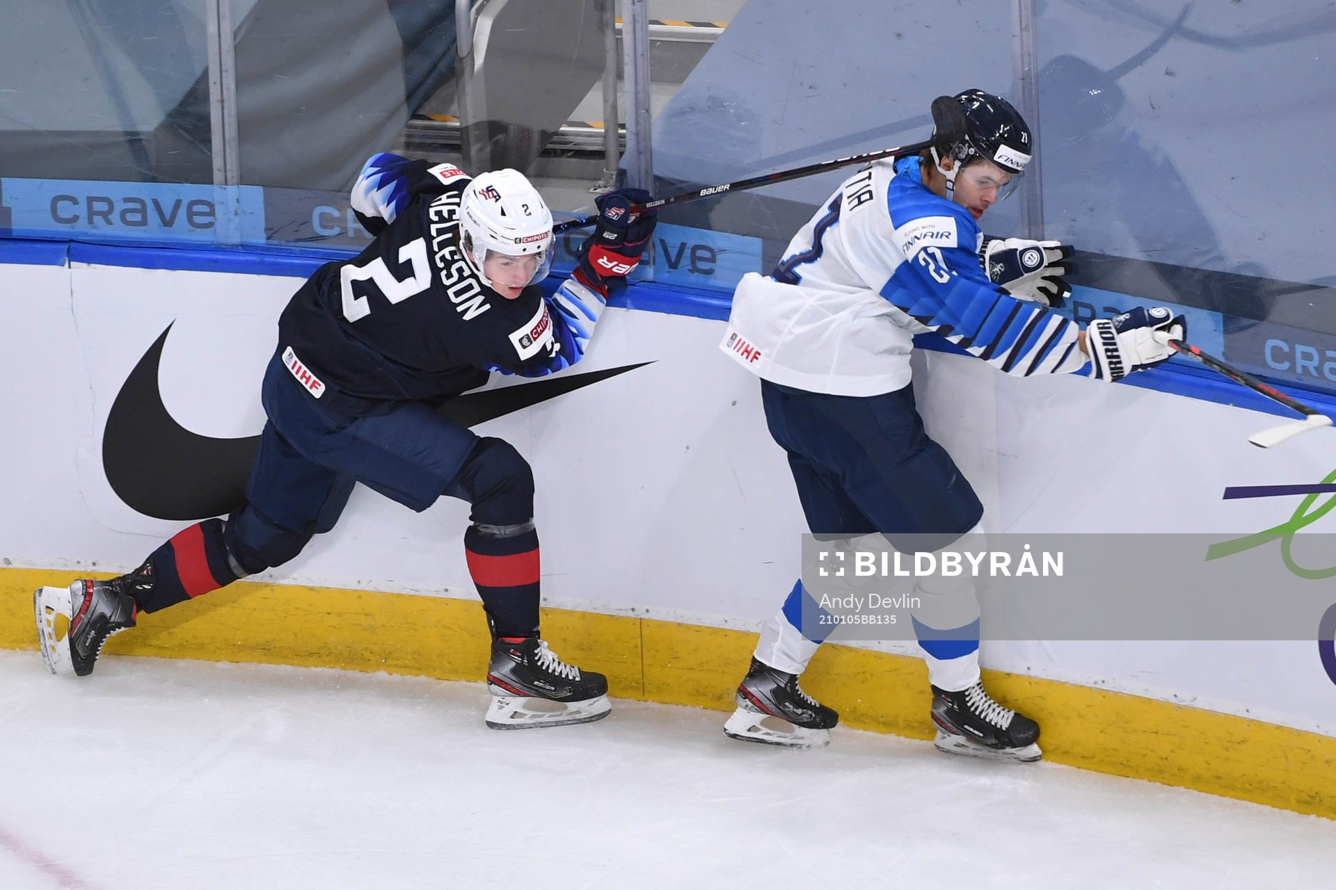 Drew Helleson of USA collides with Mikael Pyyhtia of Finland