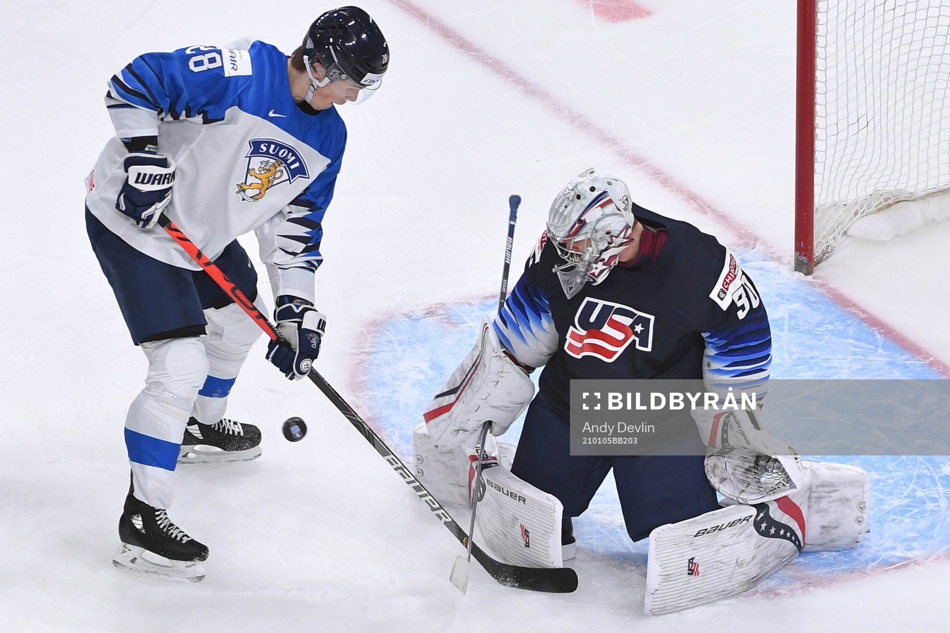 Spencer Knight of USA makes a save