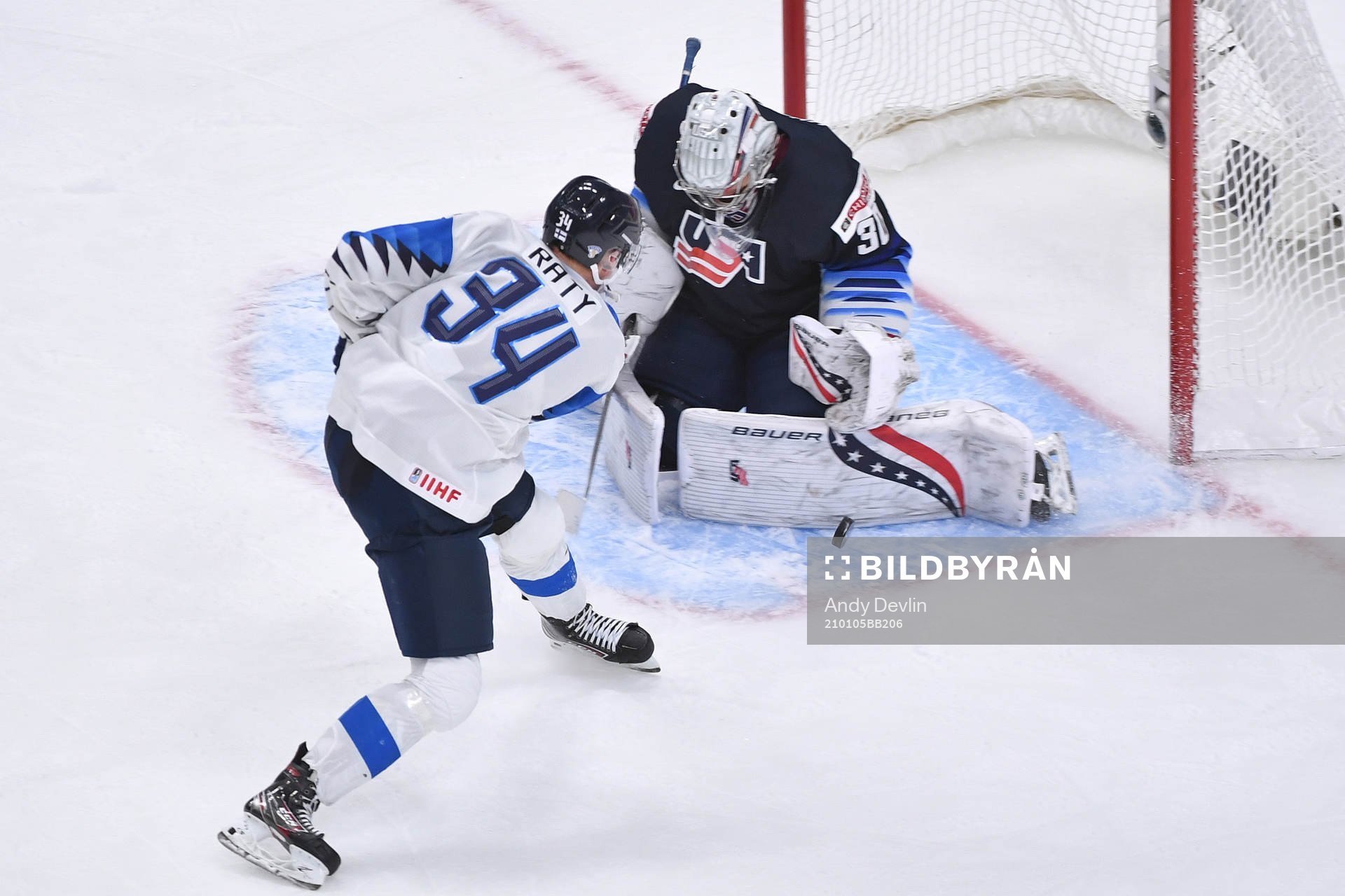 Spencer Knight of USA makes a save