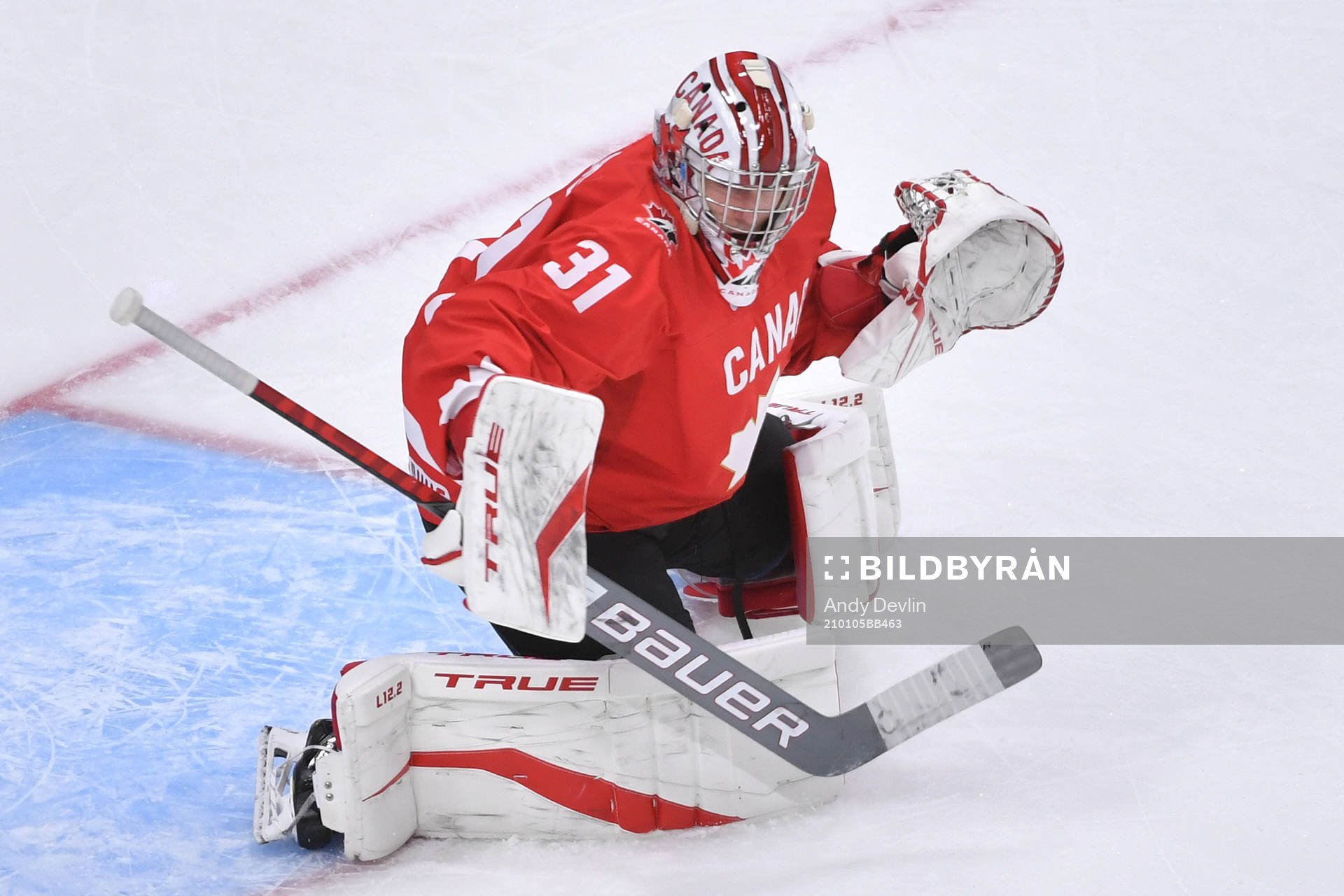 Dylan Garand of Canada participates in warm up