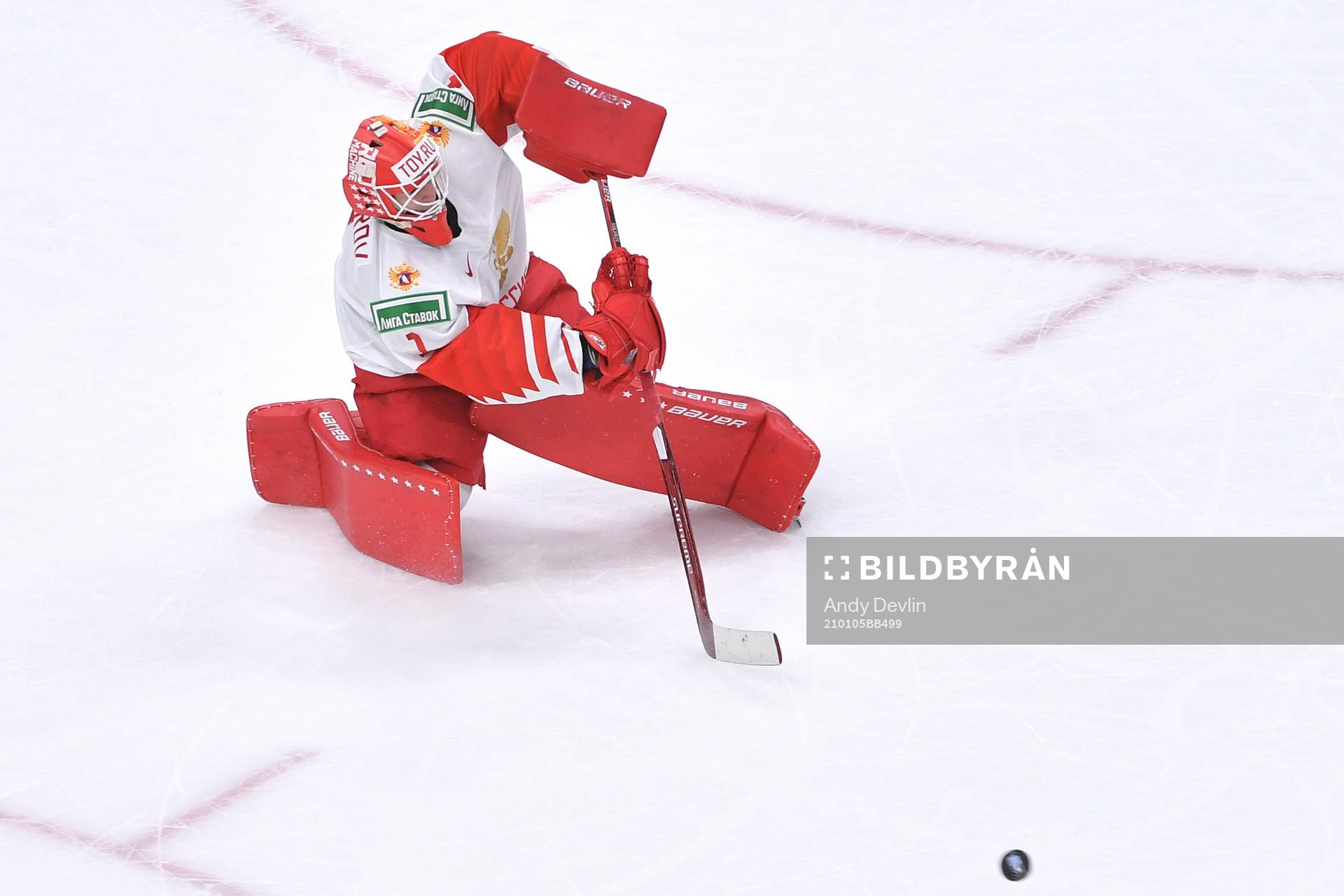 Yaroslav Askarov of Russia clears the puck
