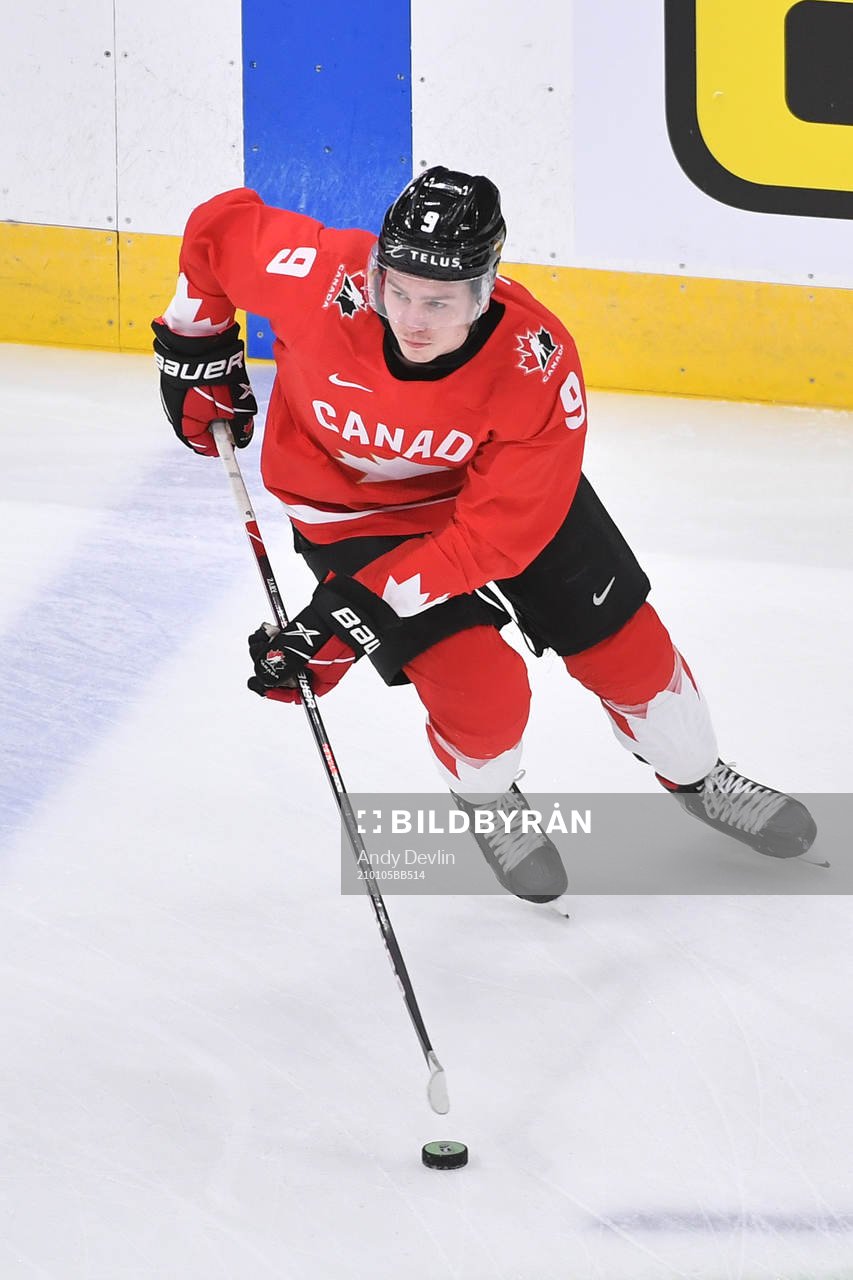 Connor Zary of Canada participates in warm up
