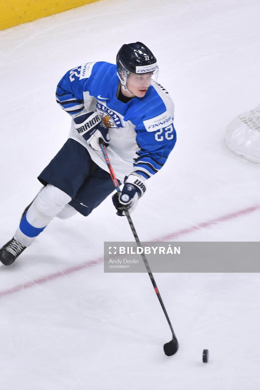 Roni Hirvonen of Finland skates with the puck