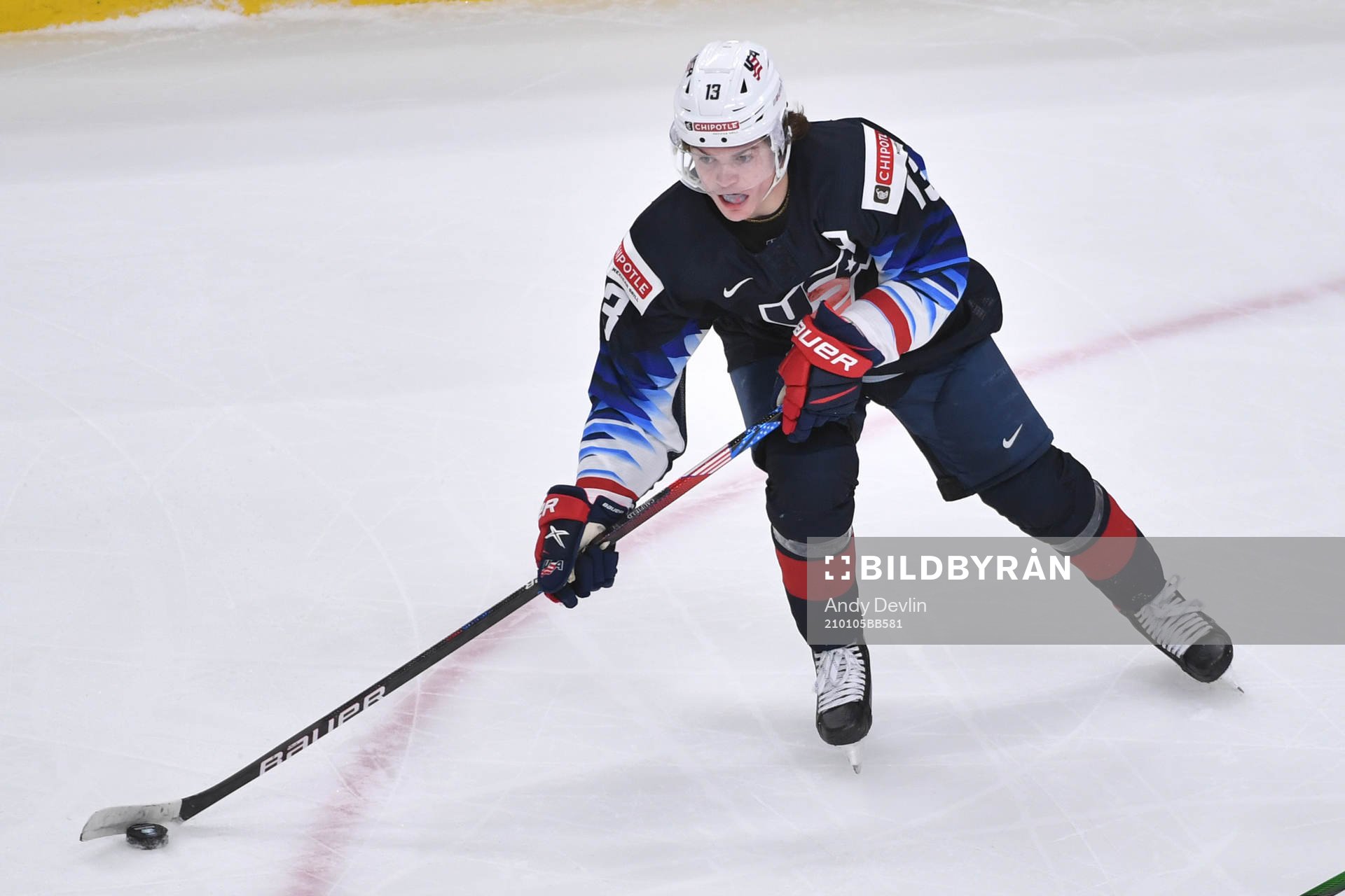 Cole Caufield of USA skates