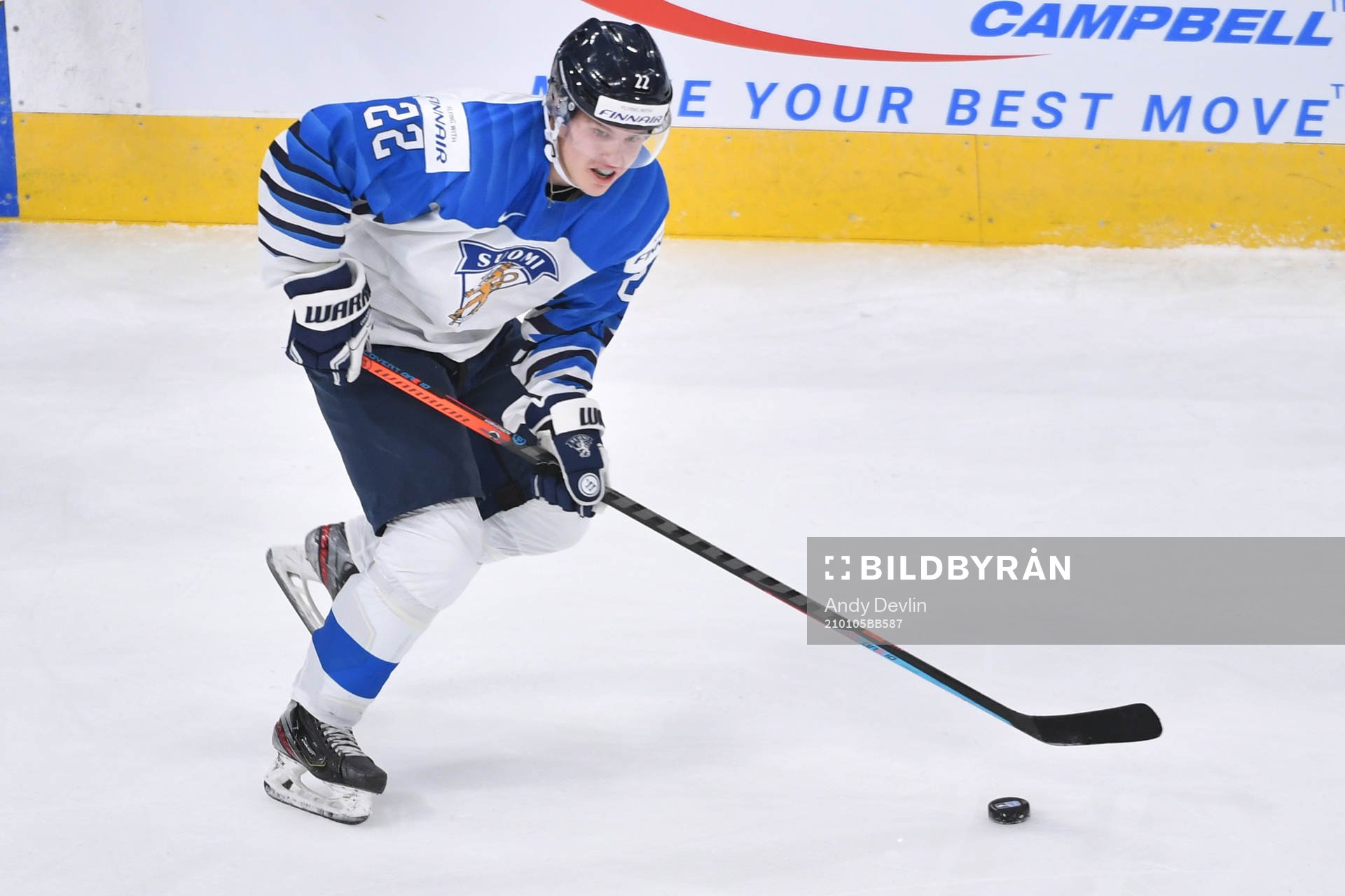 Roni Hirvonen of Finland skates with the puck