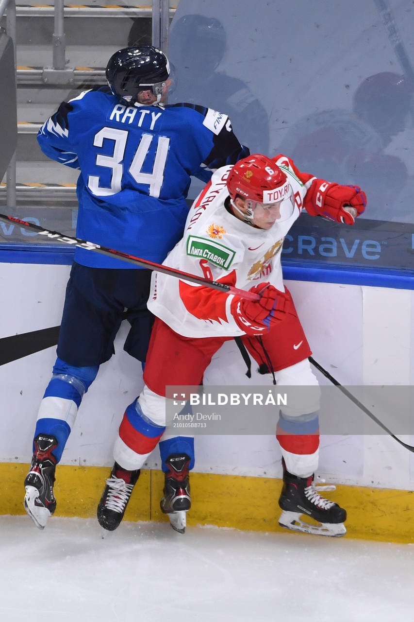 Semyon Chistyakov of Russia collides with Aku Raty of