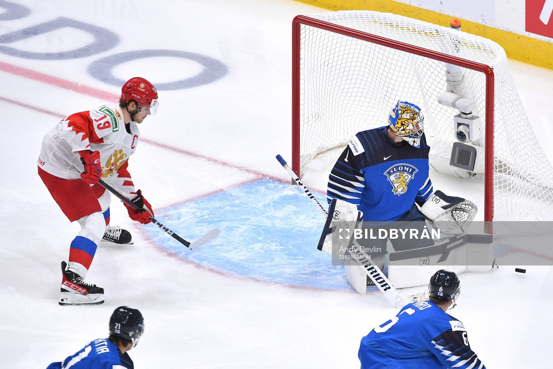 As Vasili Podkolzin of Russia advances towards the net Kari
