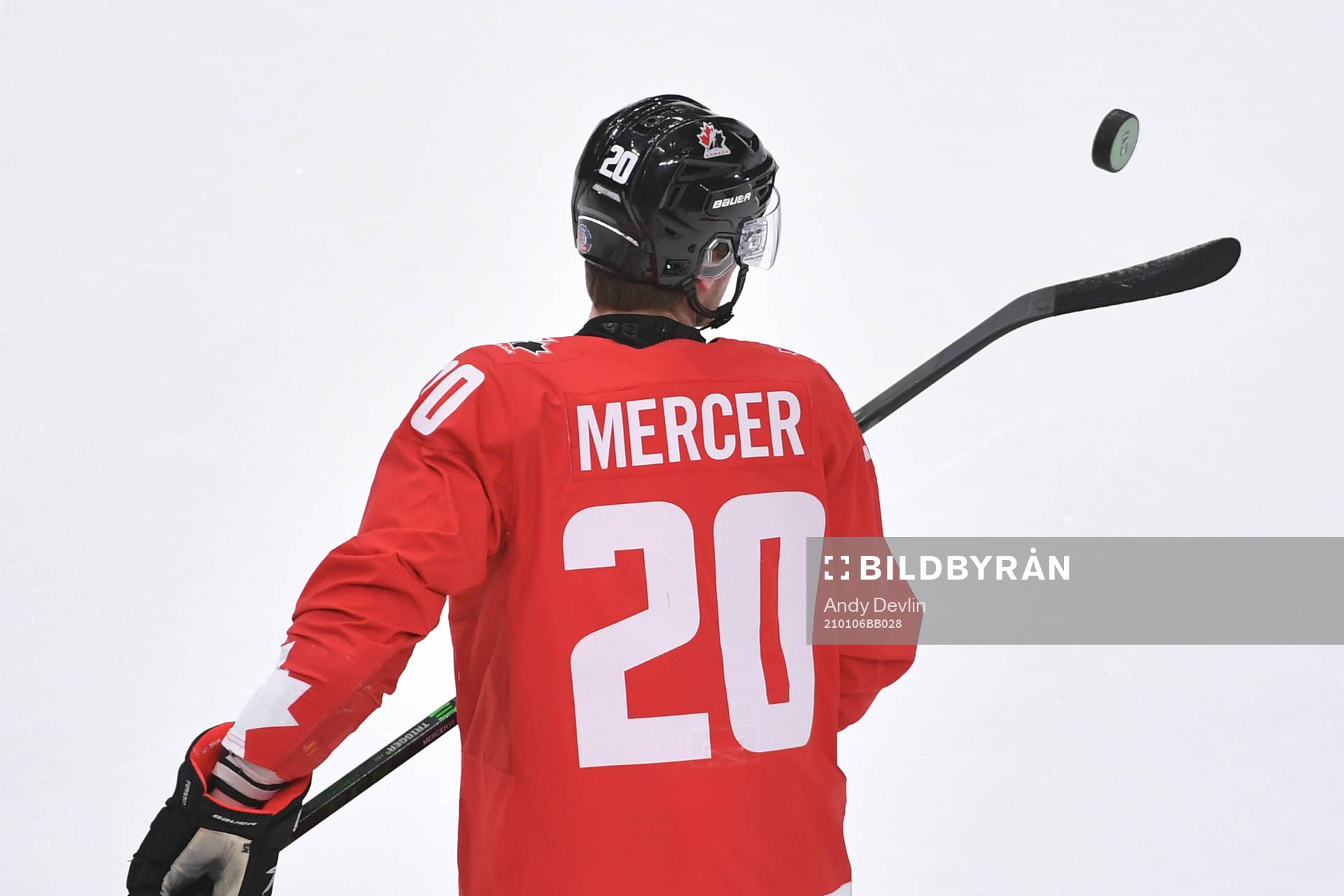Dawson Mercer of Canada bounces a puck off the blade of his