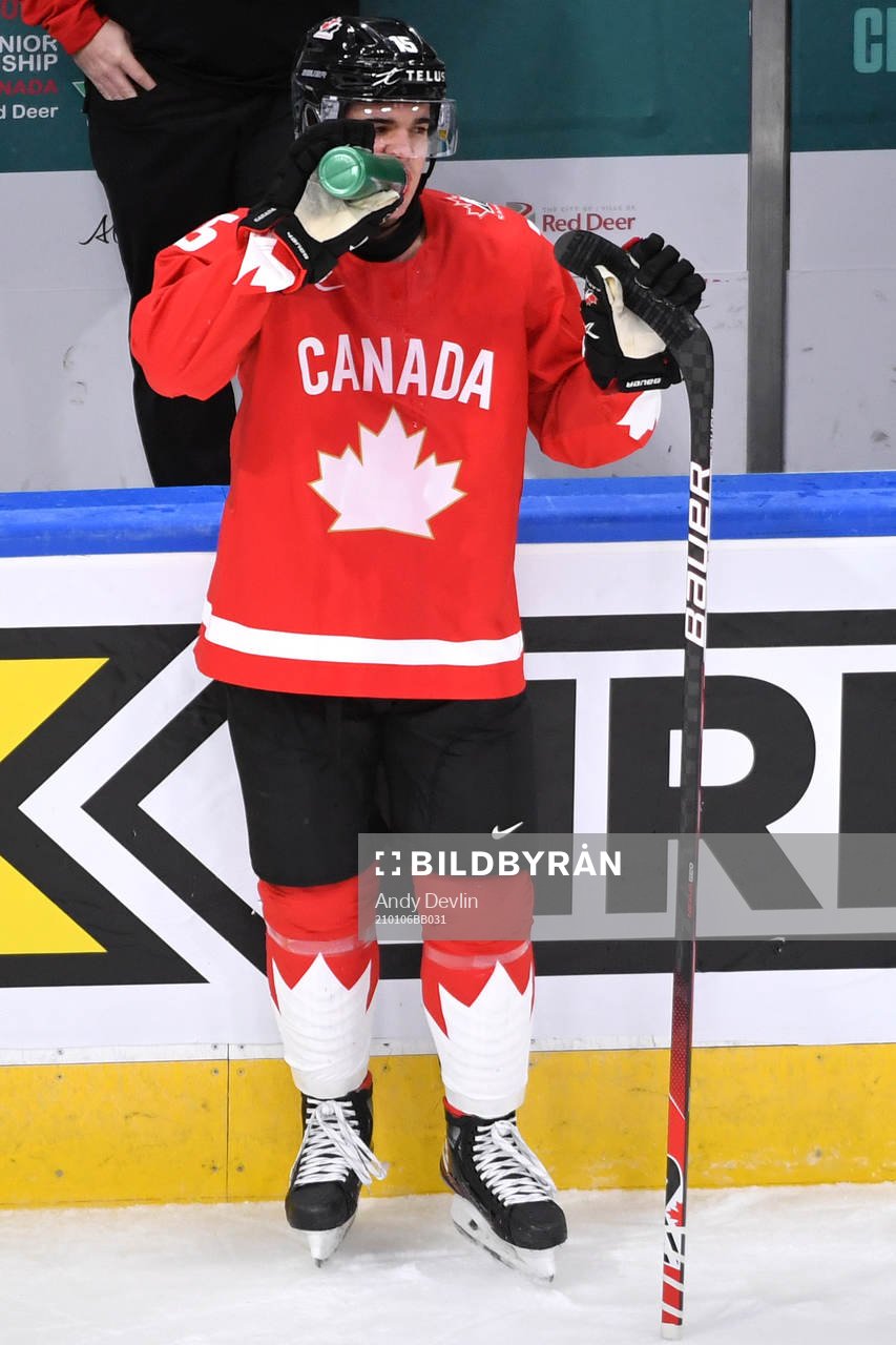Alex Newhook of Canada takes a water break