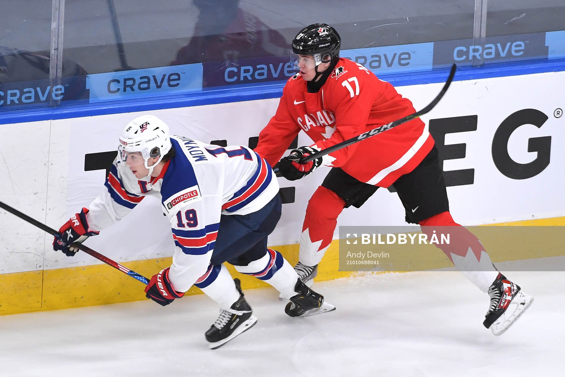 Connor McMichael of Canada pushes Patrick Moynihan of USA