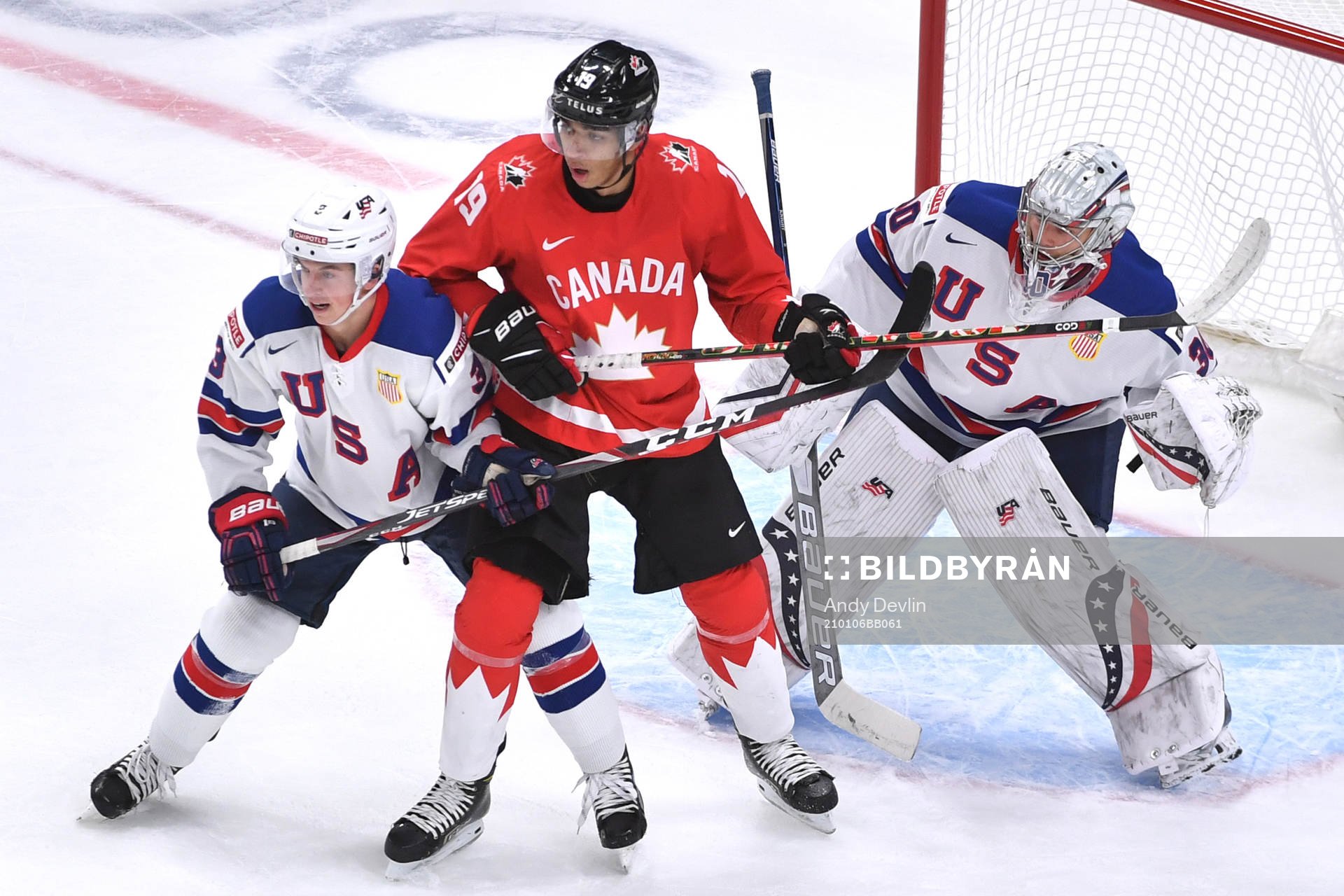 Quinton Byfield of Canada battles in front of the net with