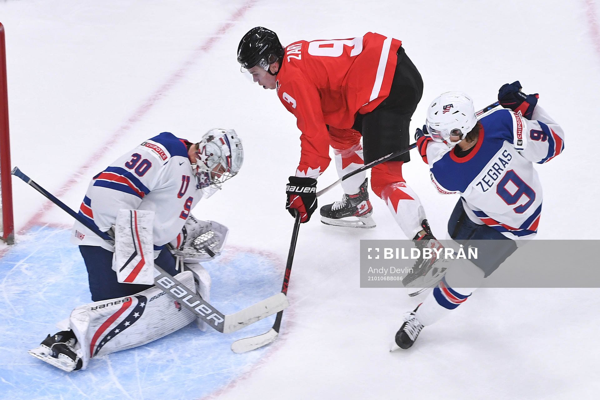 Spencer Knight of USA makes a save