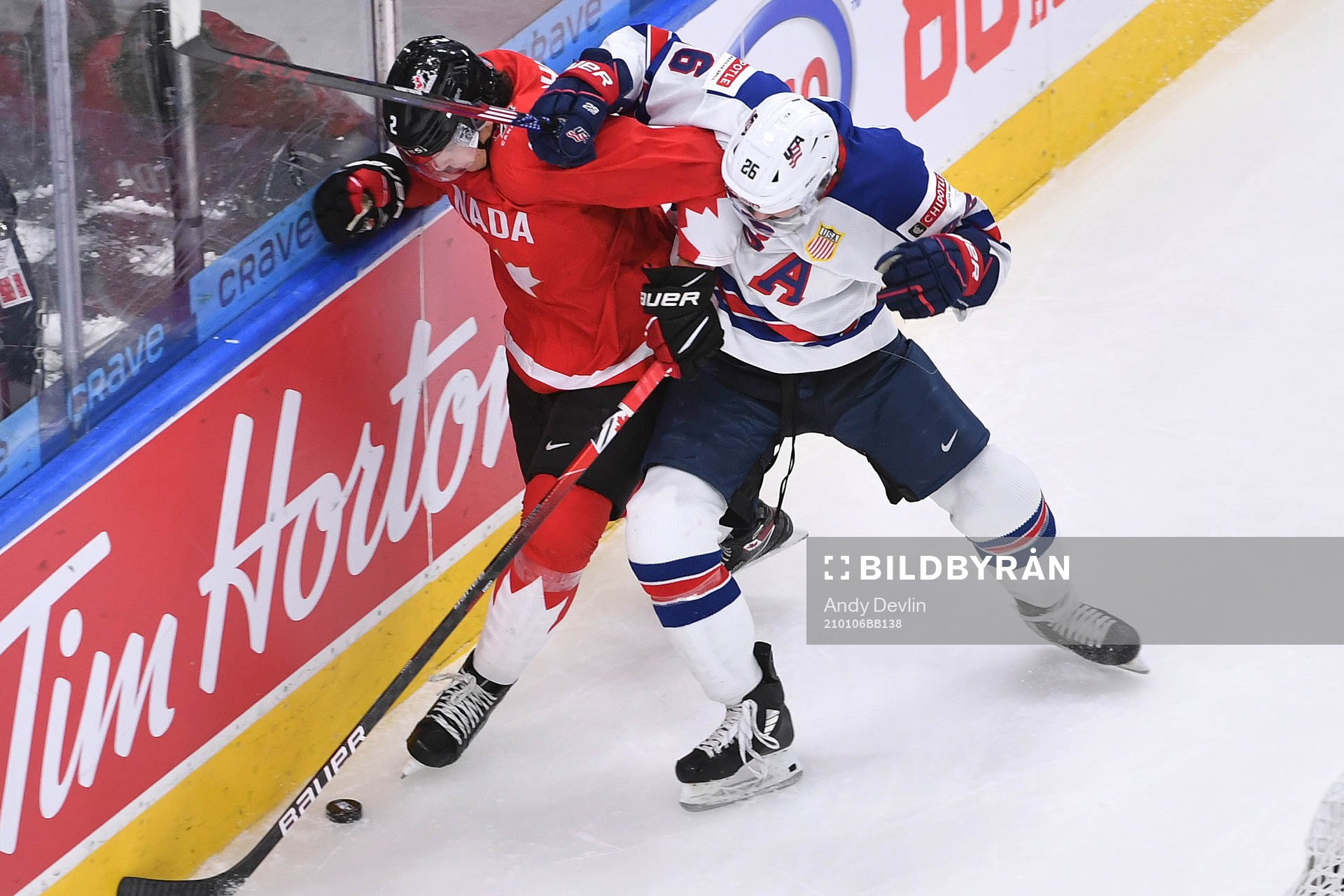 Landon Slaggert of USA and Braden Schneider of Canada