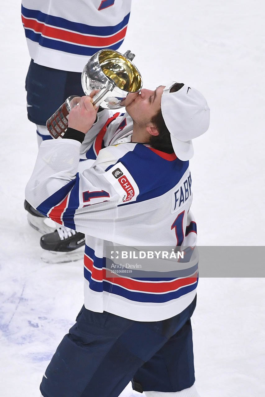 Brock Faber of USA kisses the championship trophy