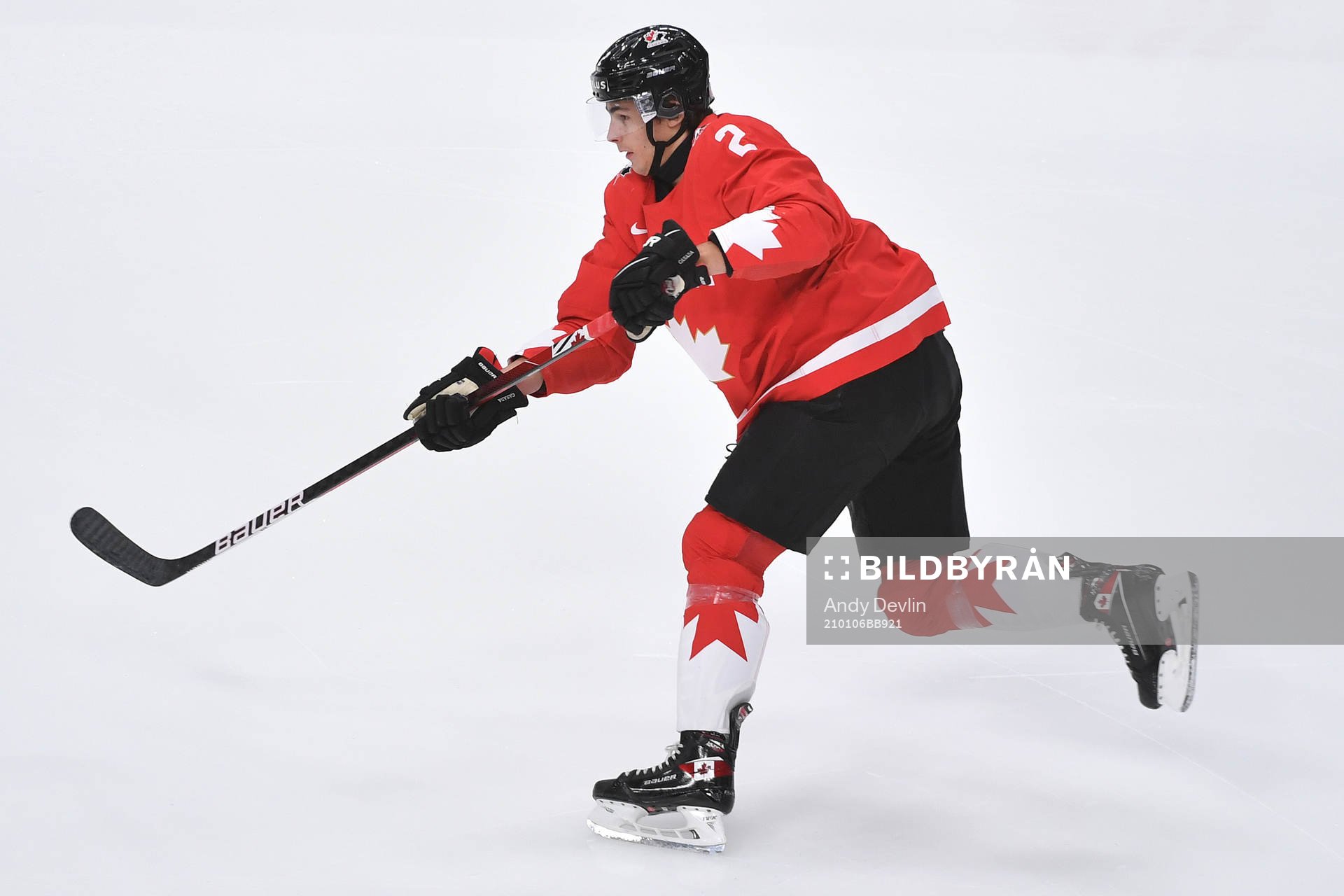 Braden Schneider of Canada shoots