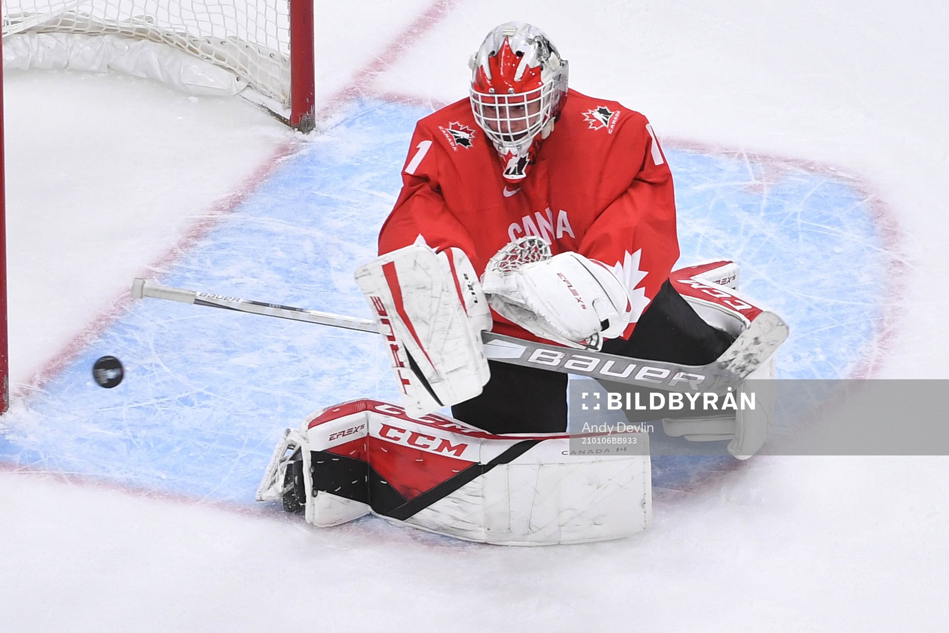 Devon Levi of Canada makes a blocker save