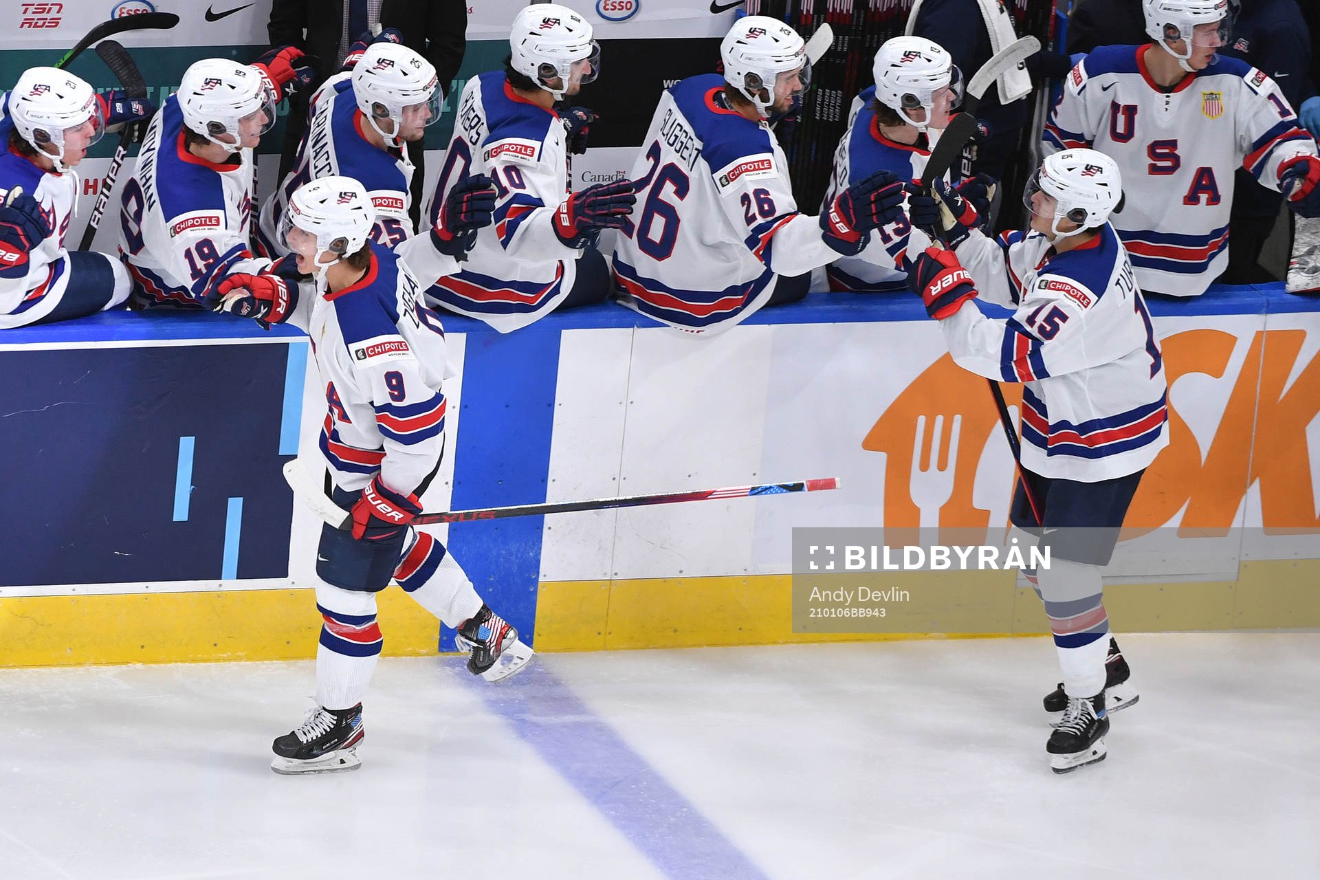 Trevor Zegras and Alex Turcotte of USA celebrate the team's