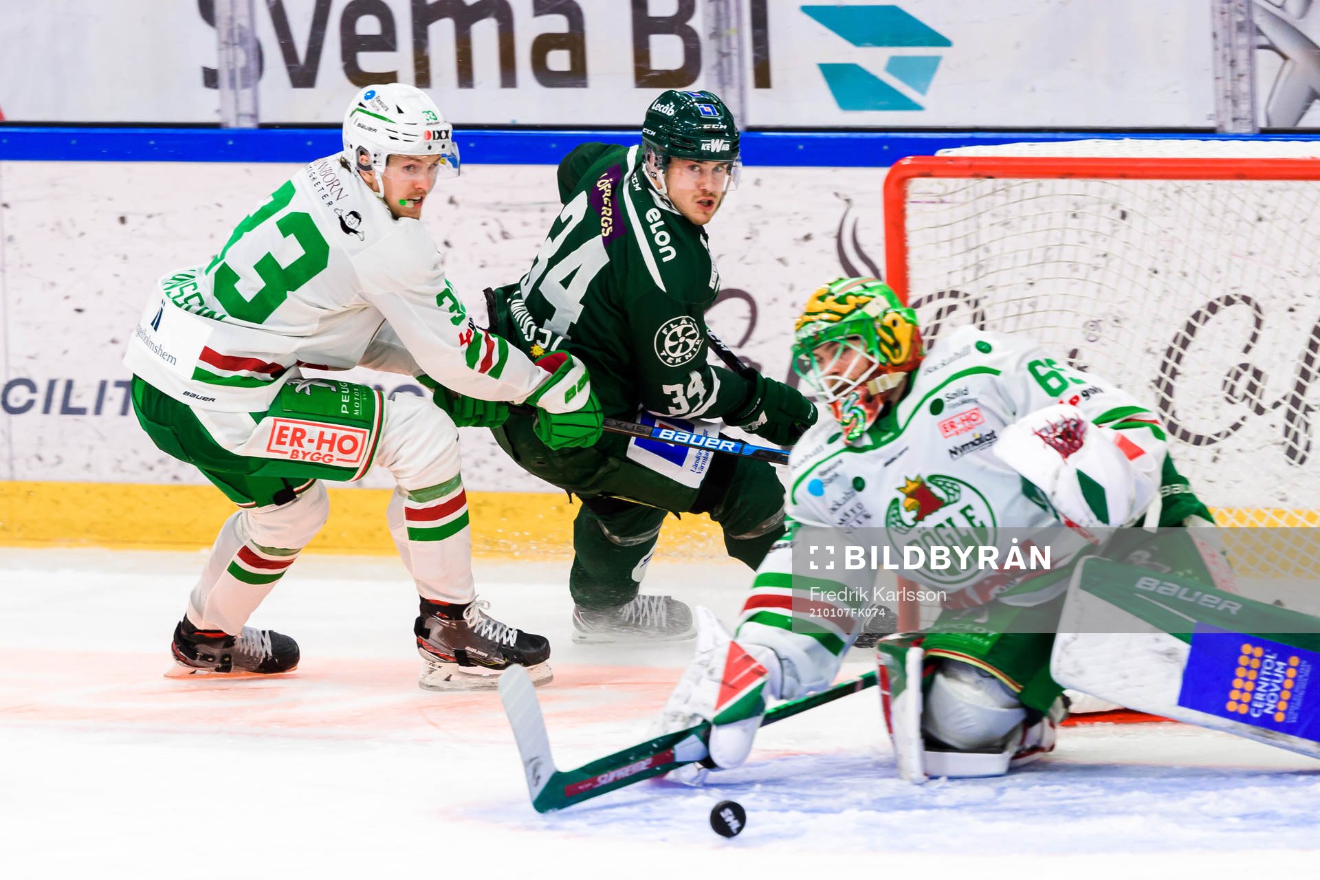 Rögles Niklas Hansson, Färjestads Michael Lindqvist och