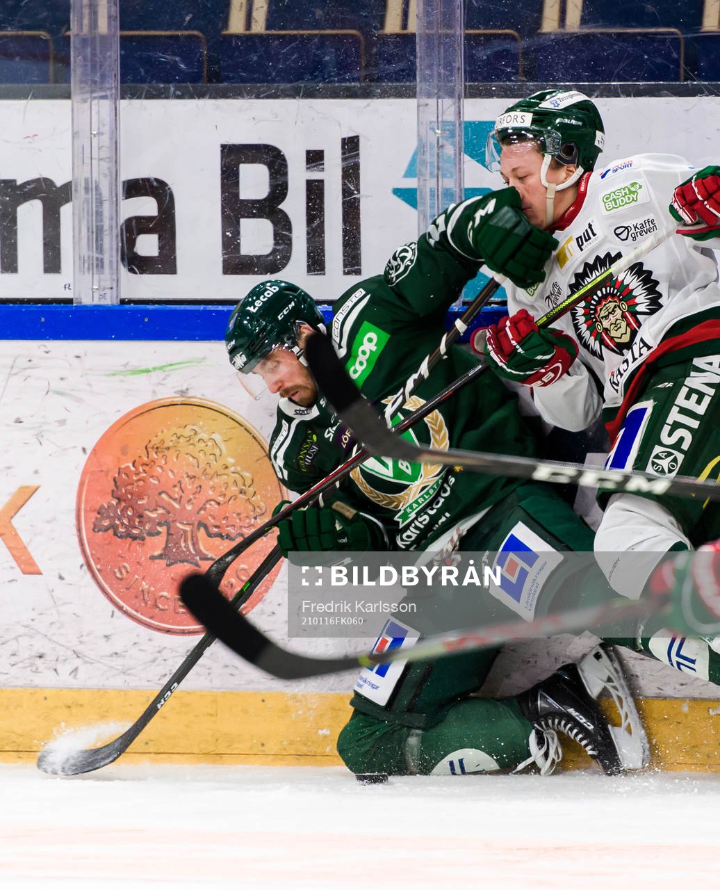 Färjestads Jonathon Blum och Frölundas Lucas Raymond