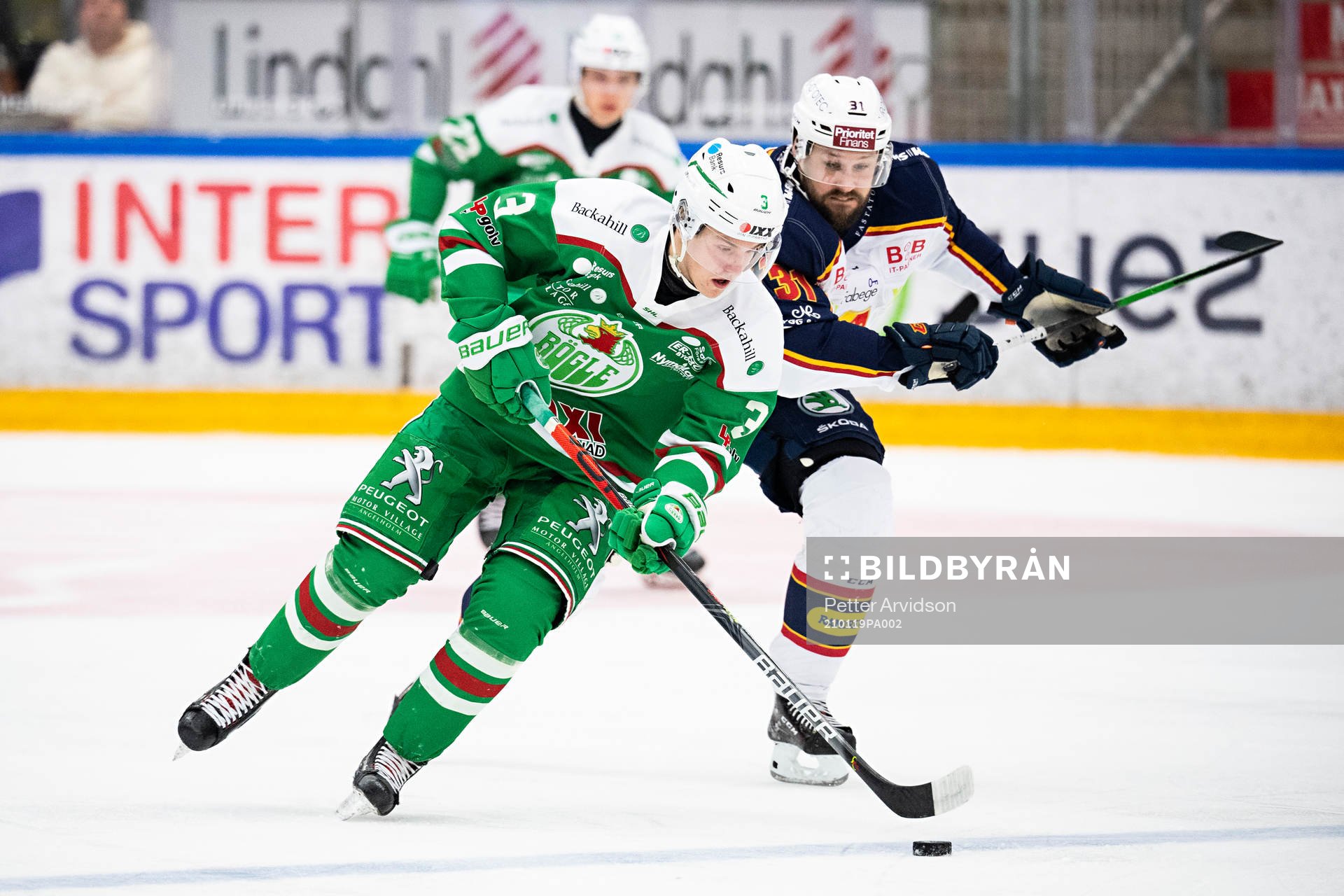Rögles Linus Sjödin och Djurgårdens Dick Axelsson