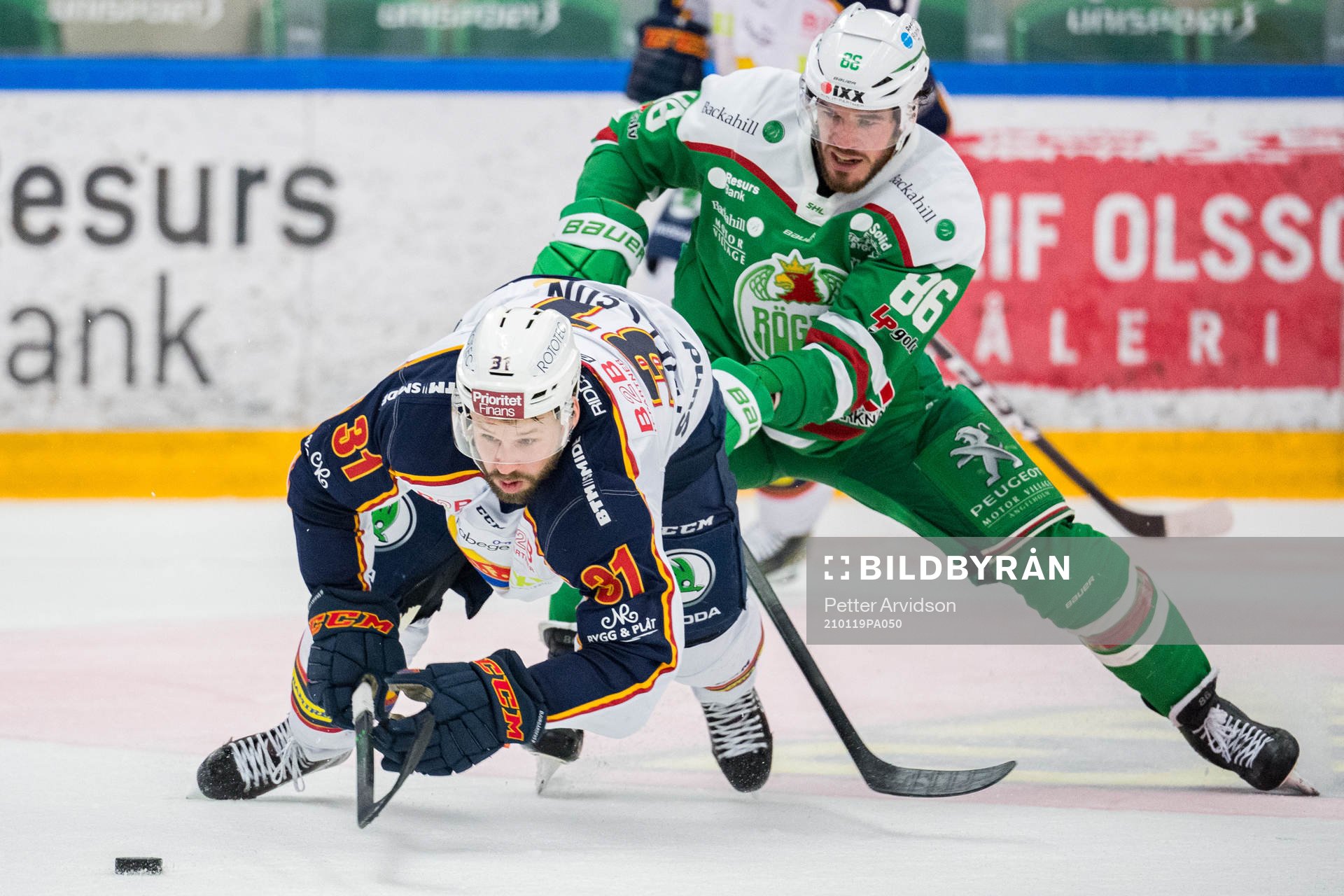 Djurgårdens Dick Axelsson och Rögles Eric Gelinas